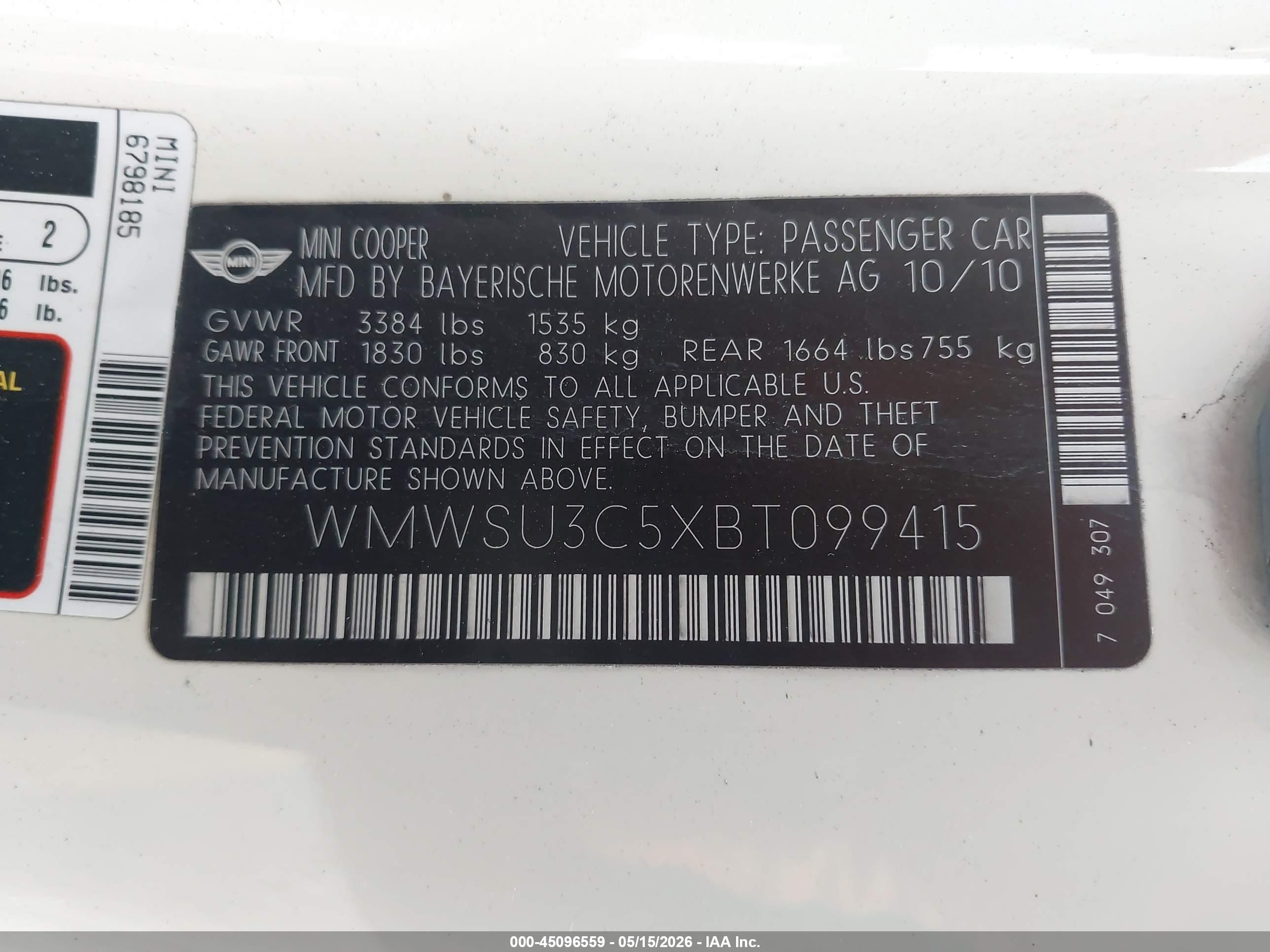 2011 Mini Cooper   White vin: WMWSU3C5XBT099415