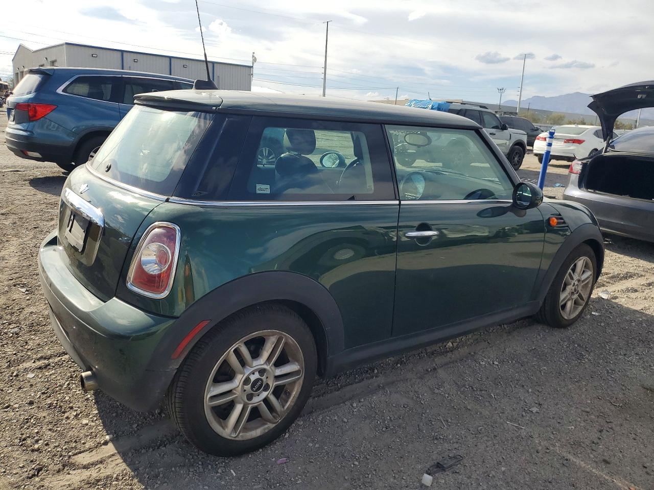 2012 Mini Cooper Green vin: WMWSU3C5XCT184577