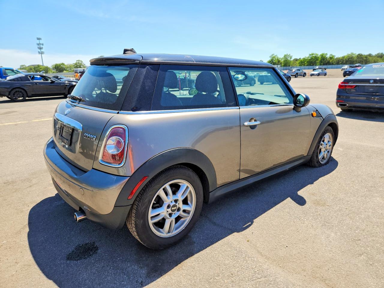 2012 Mini Cooper Tan vin: WMWSU3C5XCT255048