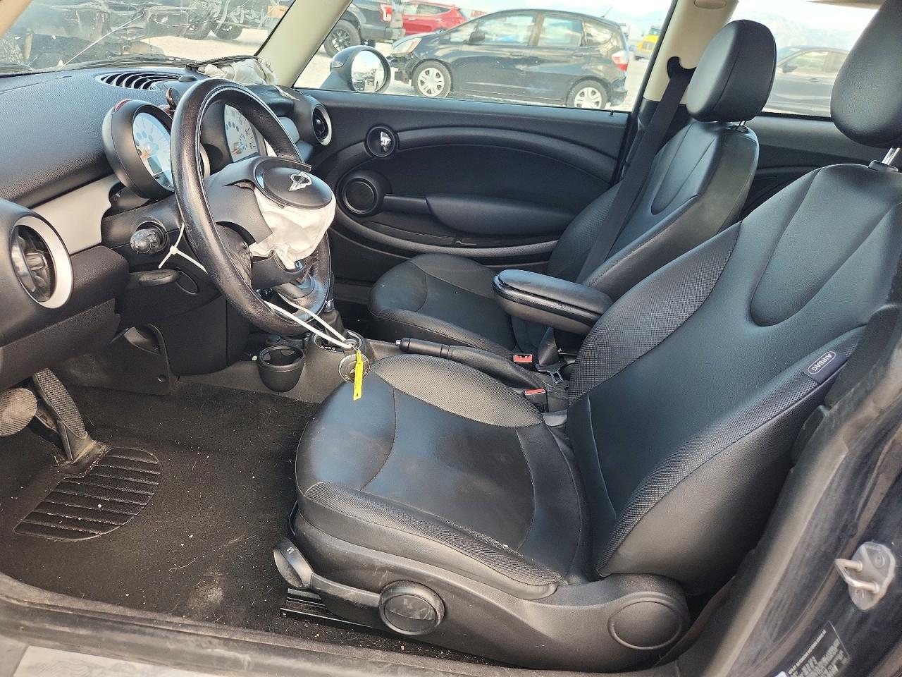2012 Mini Cooper Black vin: WMWSU3C5XCT543748