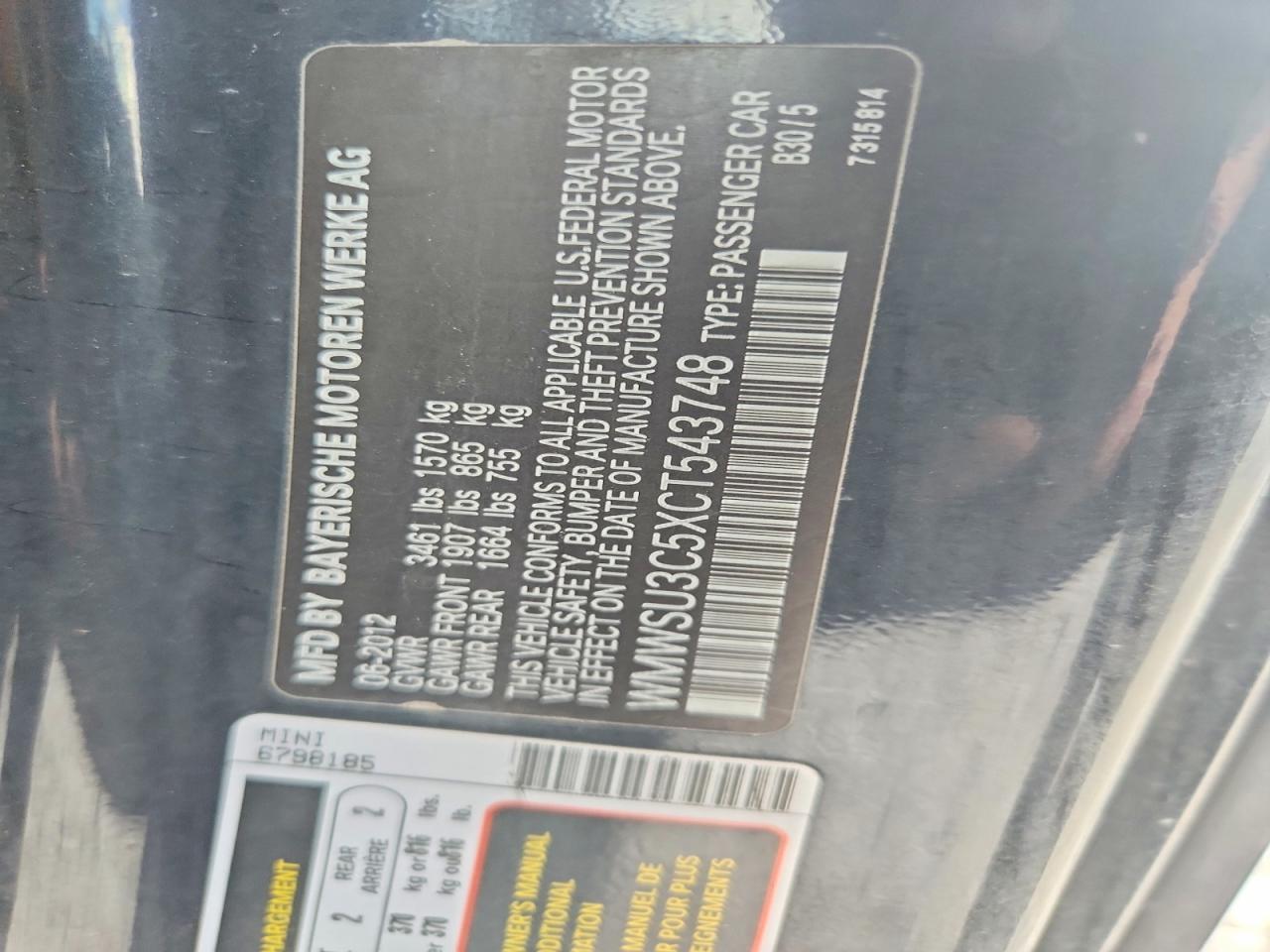 2012 Mini Cooper Black vin: WMWSU3C5XCT543748