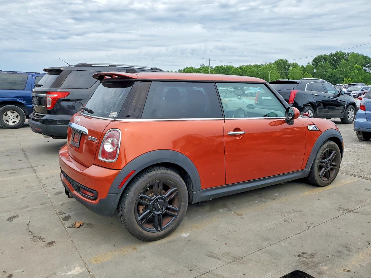2012 Mini Cooper S Orange vin: WMWSV3C51CTY18047