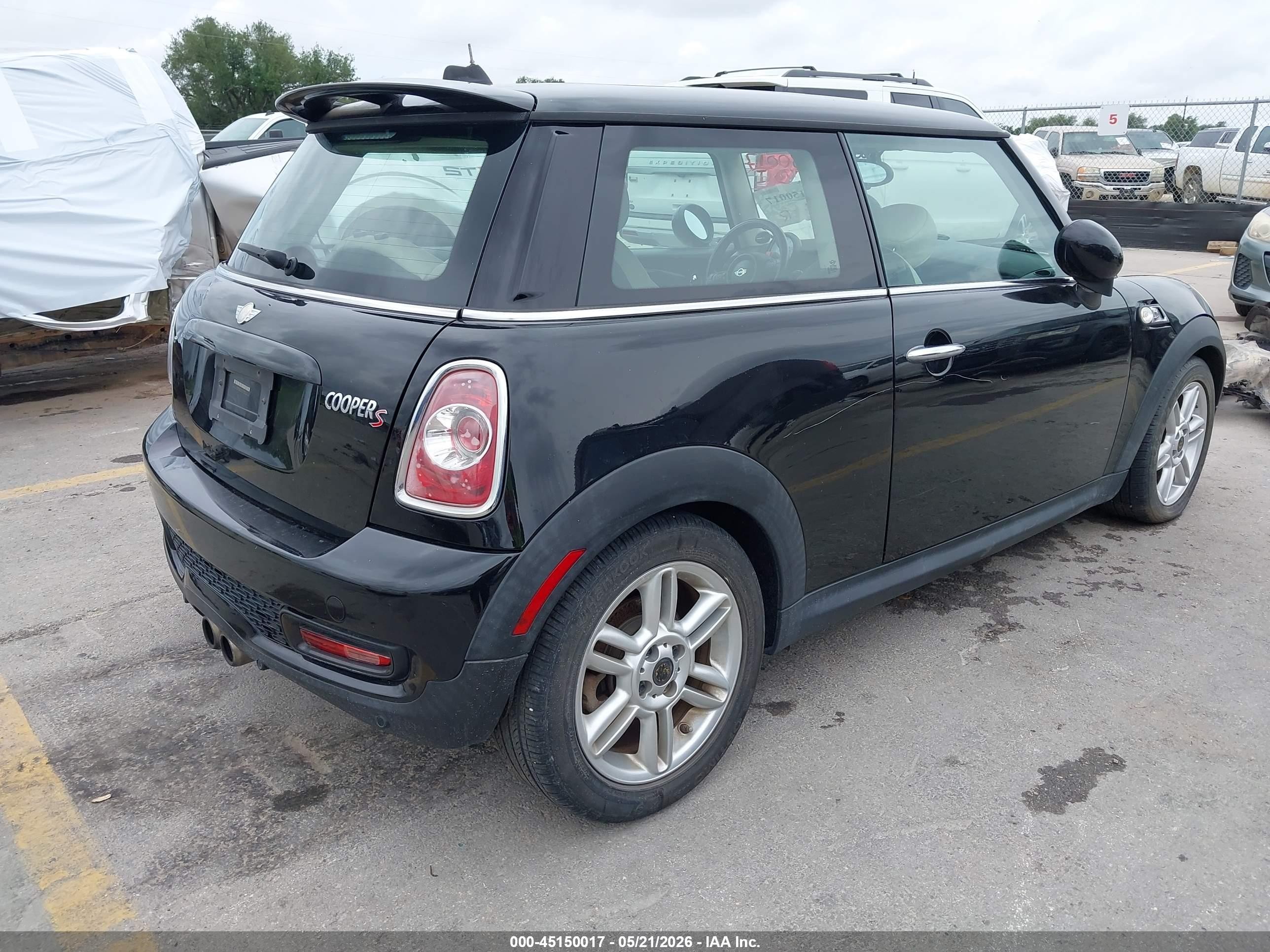 2012 Mini Cooper S   Black vin: WMWSV3C53CTY17112
