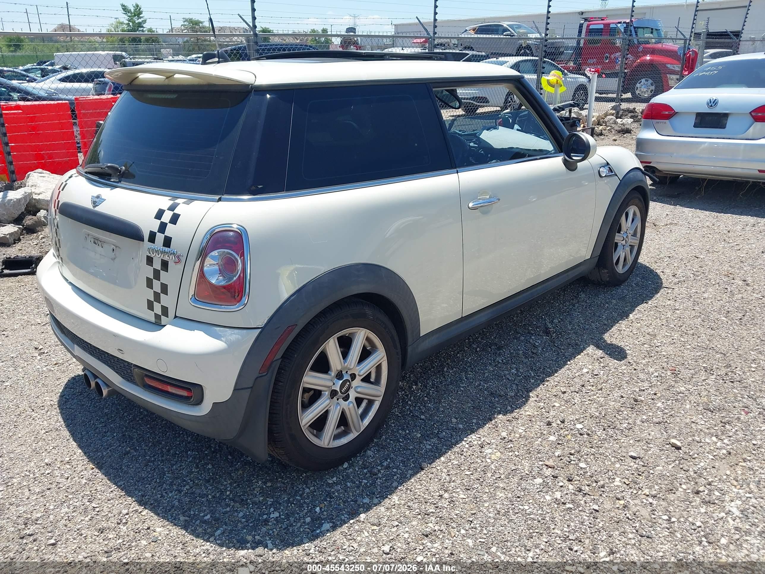 2011 Mini Cooper S   White vin: WMWSV3C57BTY14051