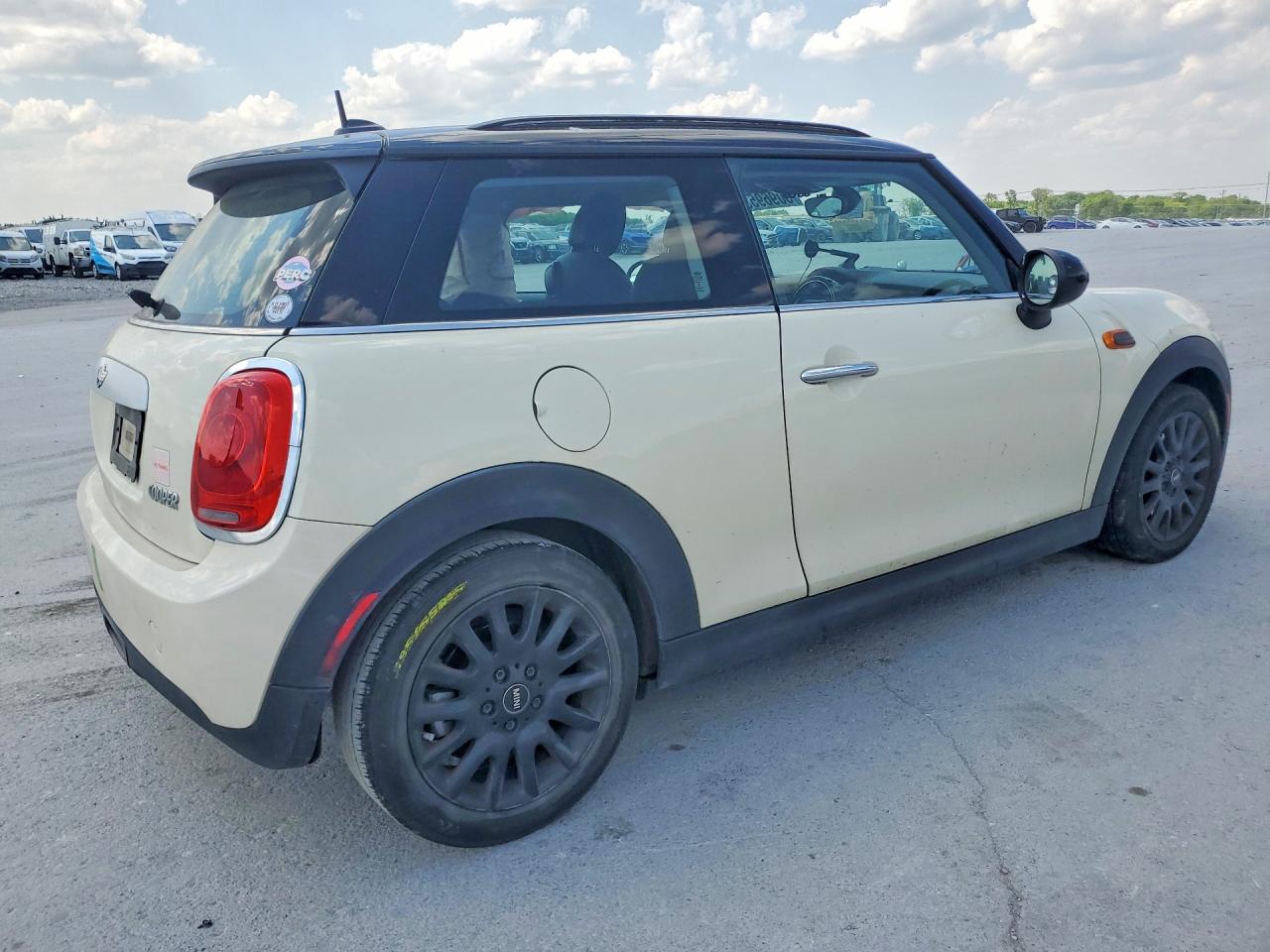 2015 Mini Cooper Cream vin: WMWXM5C54FT942824