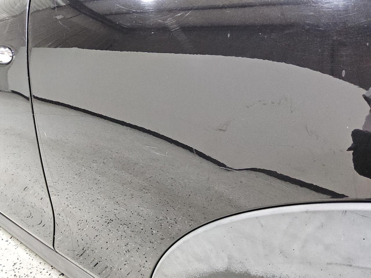 2015 Mini Cooper Black vin: WMWXM5C56F3A57074 Damage: Left Qtr Panel, Light Scratch, 2 To 3 Inches