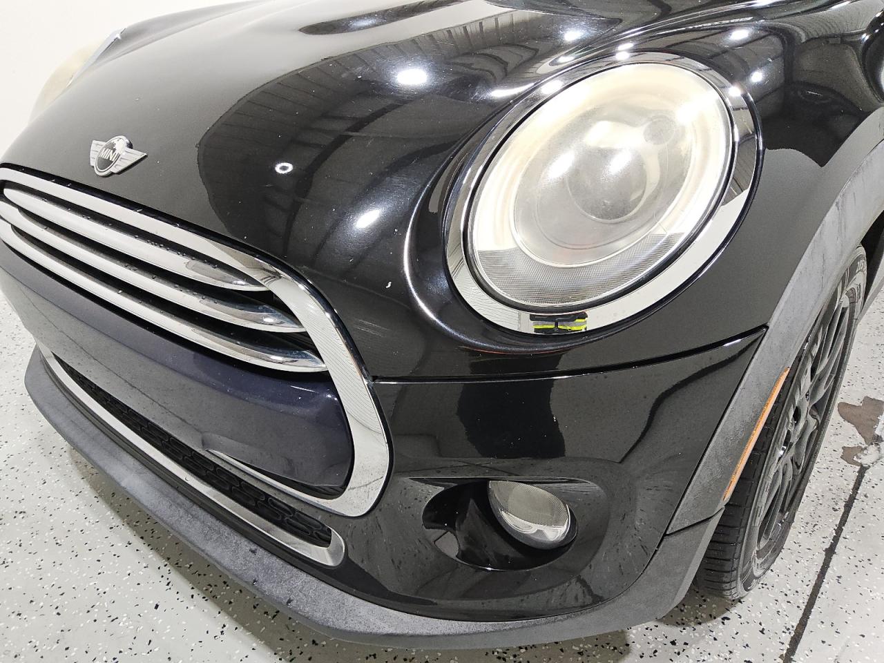 2015 Mini Cooper Black vin: WMWXM5C56F3A57074 Damage: Left Head Lamp, Faded, Repair Required