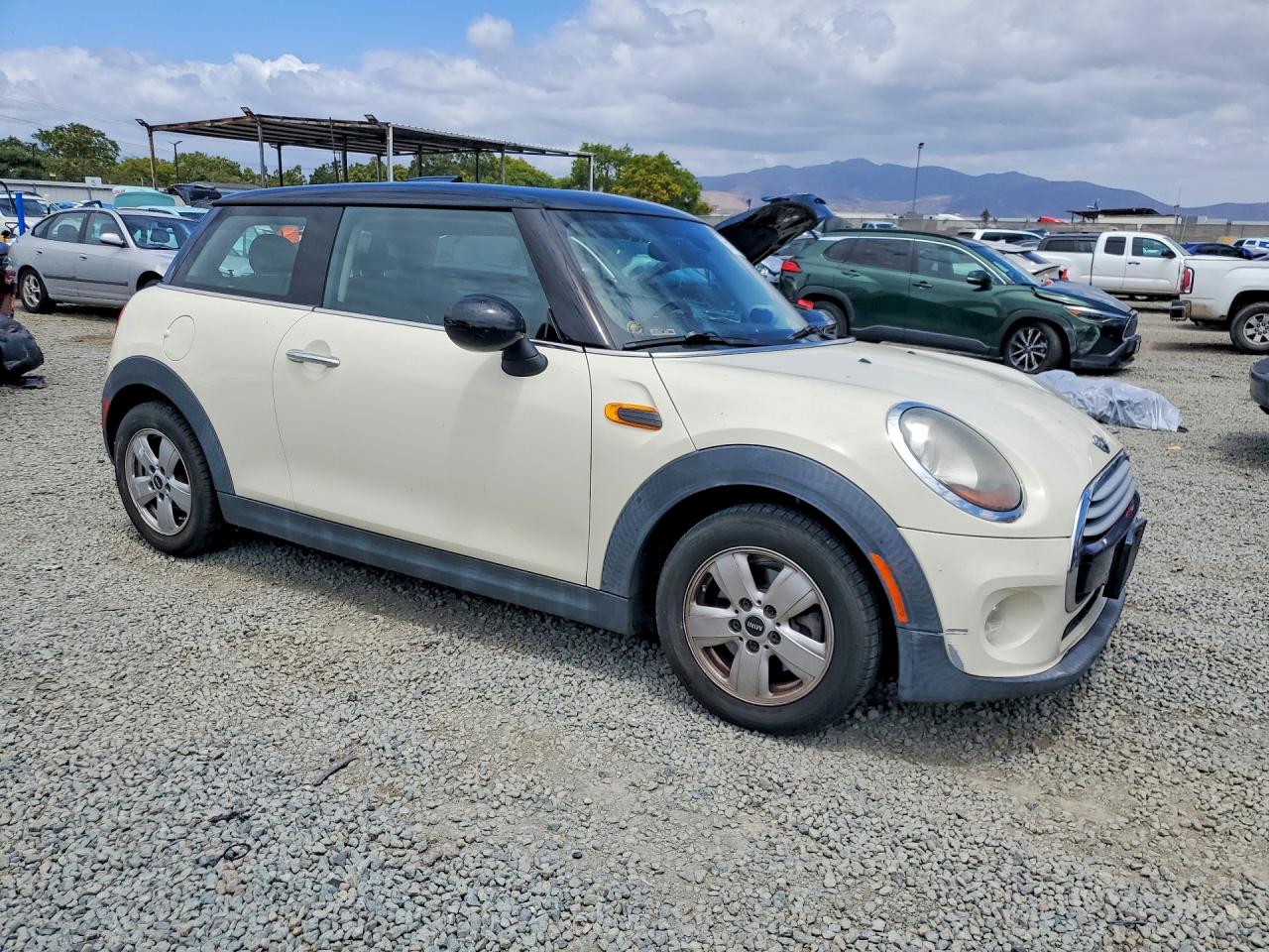 2014 Mini Cooper Cream vin: WMWXM5C5XET932409