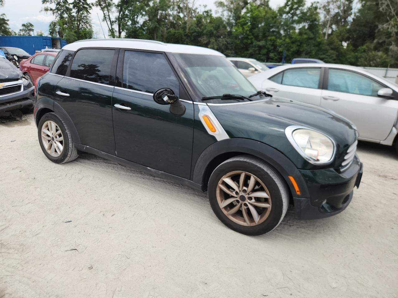 2014 Mini Cooper Countryman Green vin: WMWZB3C5XEWR36767 Damage: Right Front Mirror Housing, Broken, Replacement Required