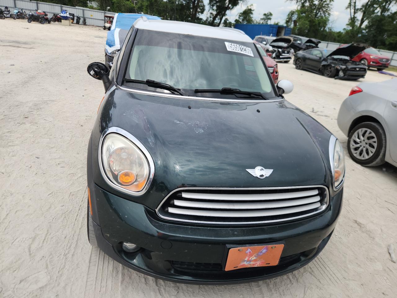 2014 Mini Cooper Countryman Green vin: WMWZB3C5XEWR36767 Damage: Left Head Lamp, Faded, Repair Required