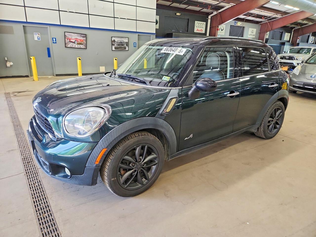 2012 Mini Cooper S Countryman Green vin: WMWZC5C52CWL57052