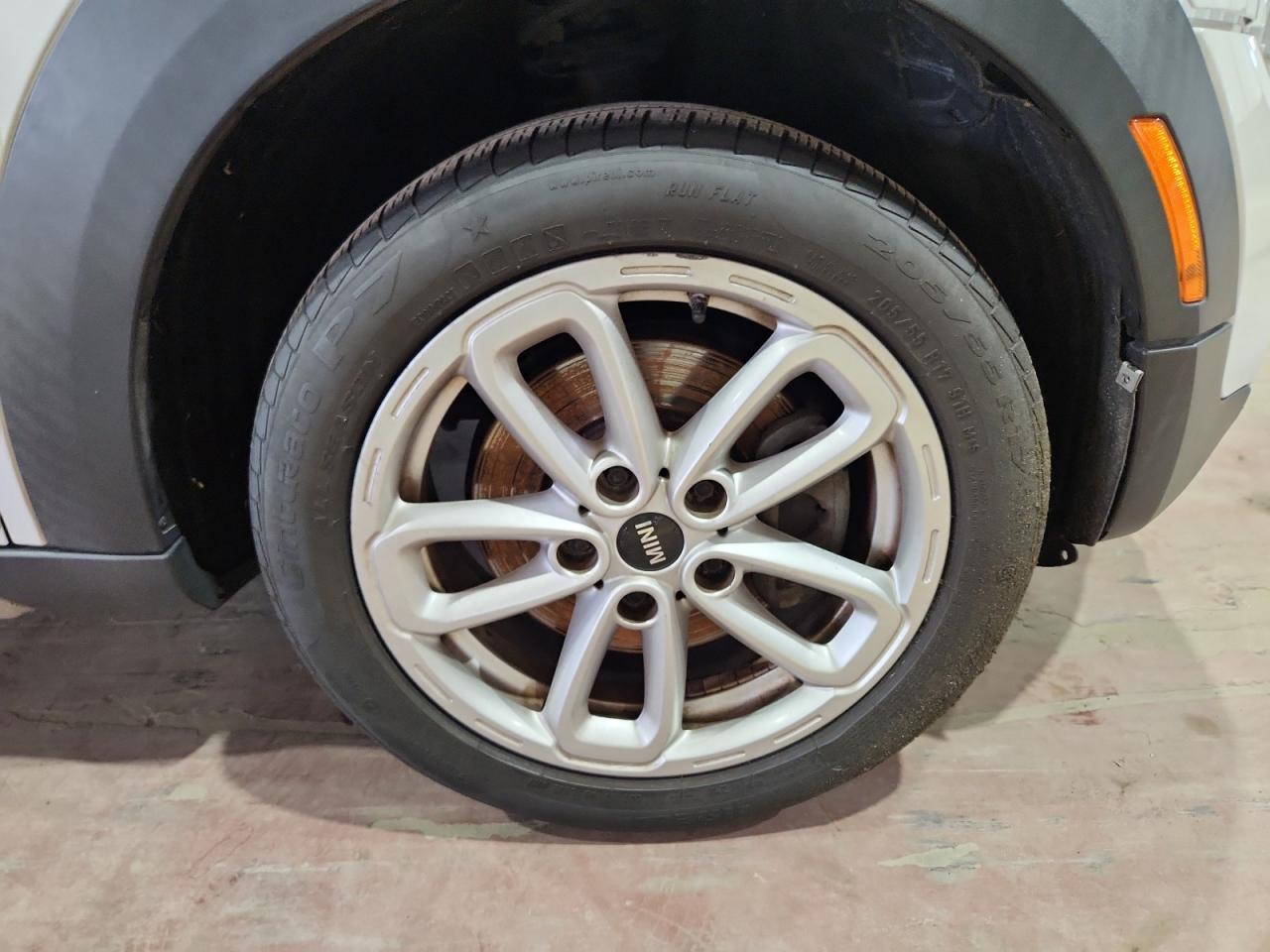 2015 Mini Cooper S Countryman White vin: WMWZC5C57FWP45642 Damage: Right Front Wheel, Curb Rash, 1 To 2 Inches
