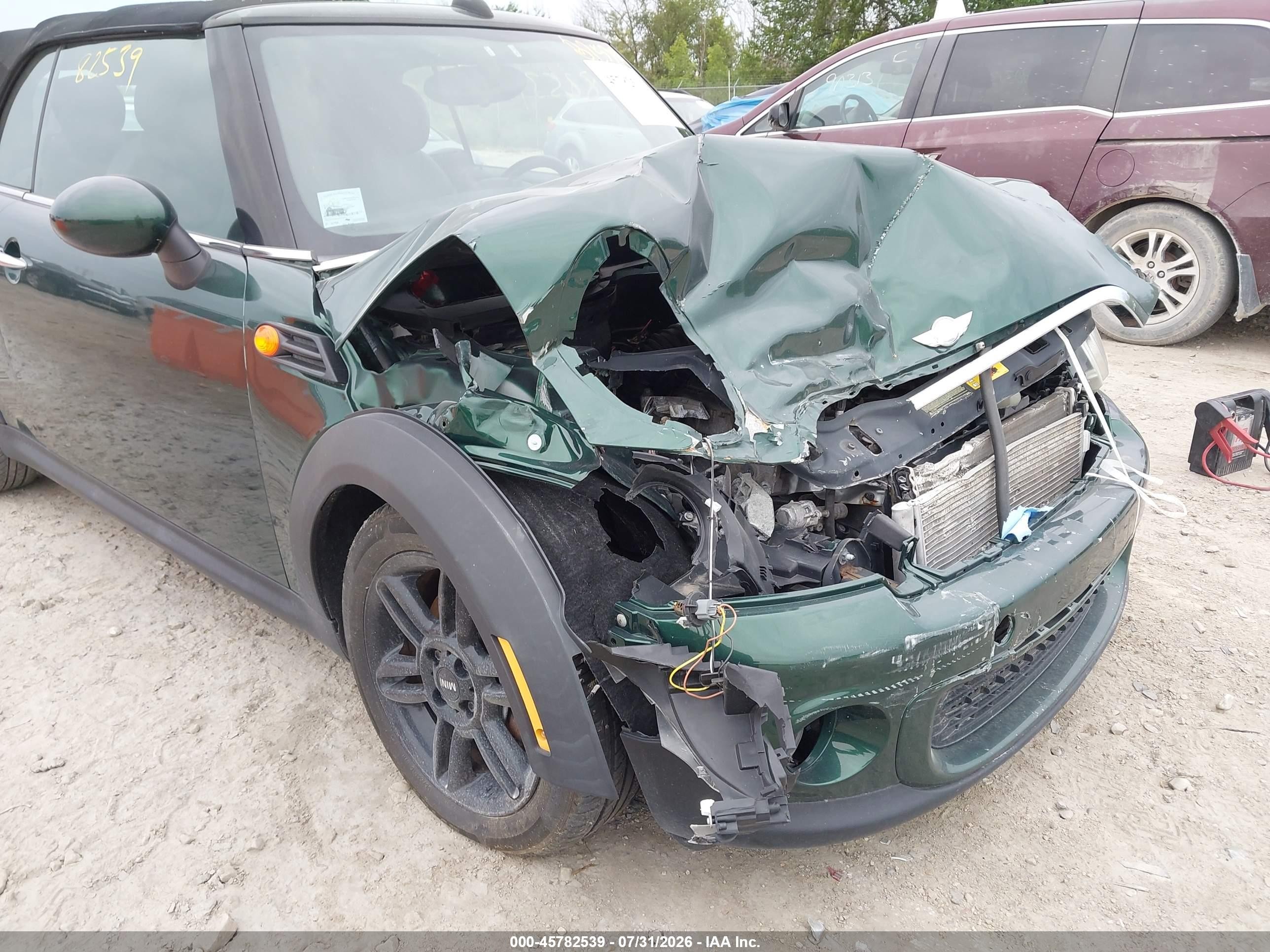 2013 Mini Convertible Cooper Зеленый vin: WMWZN3C50DT135367