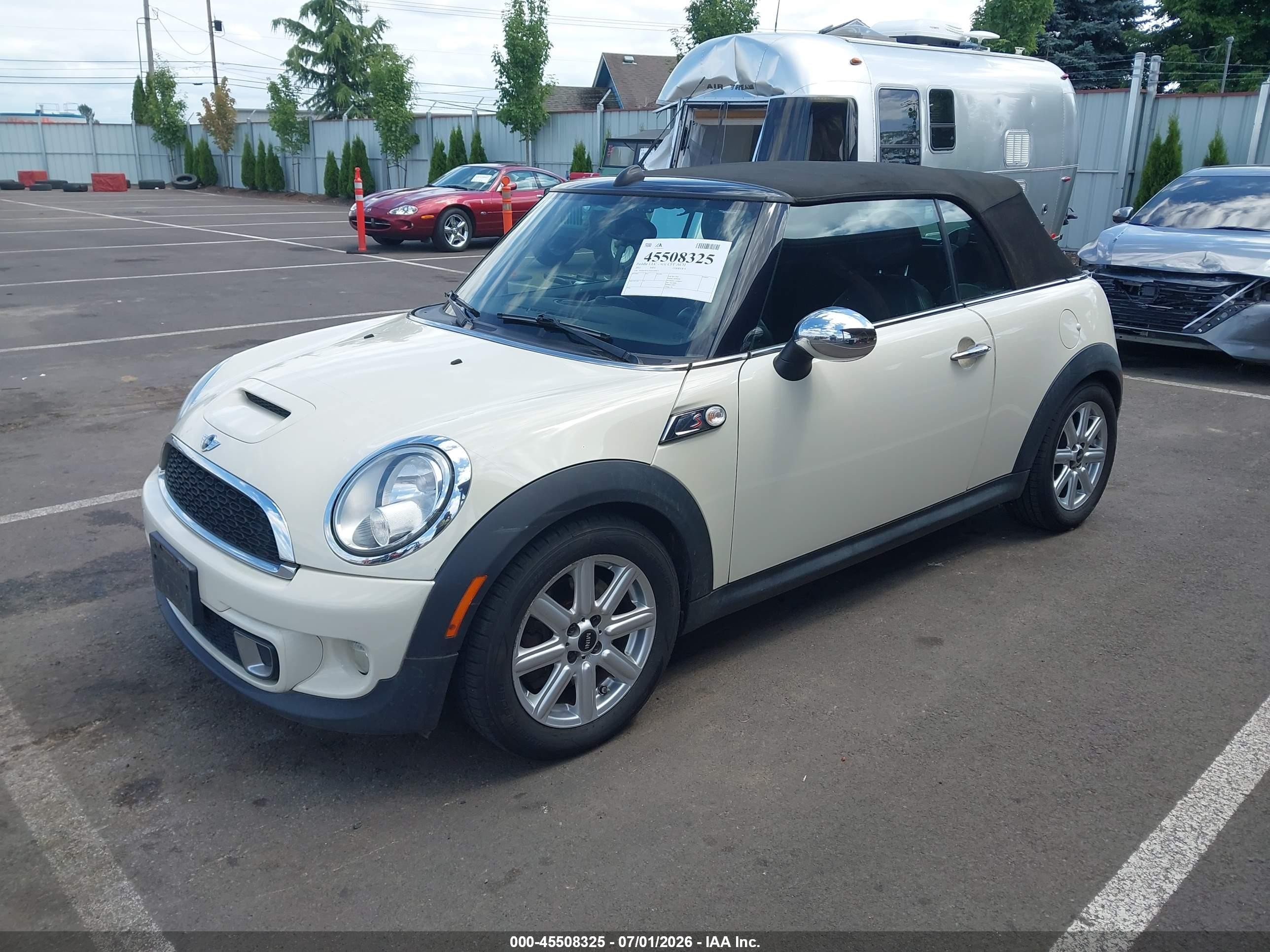 2011 Mini Cooper S   Cream vin: WMWZP3C55BT249033