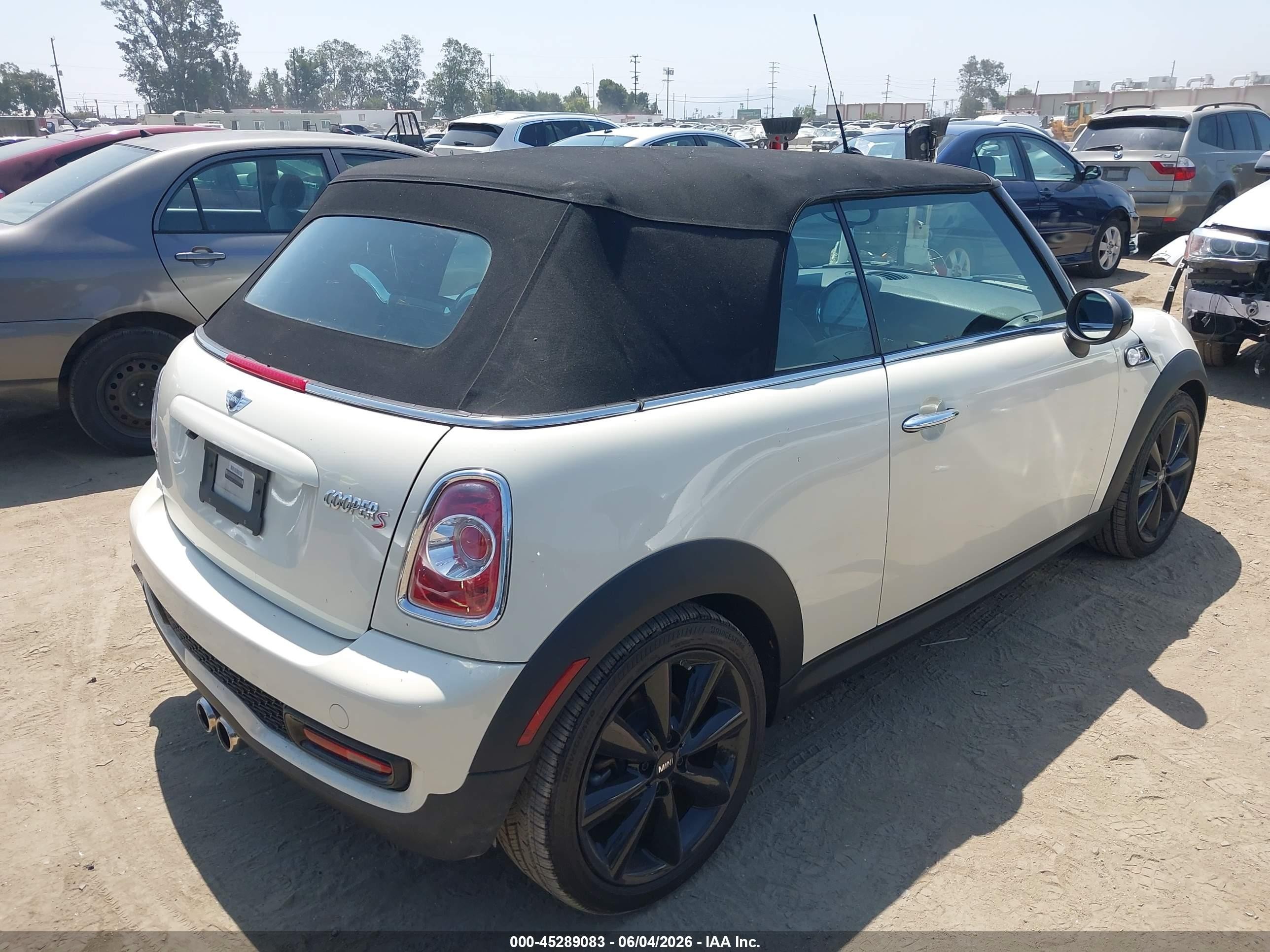 2014 Mini Convertible Cooper S Cream vin: WMWZP3C57ET707157