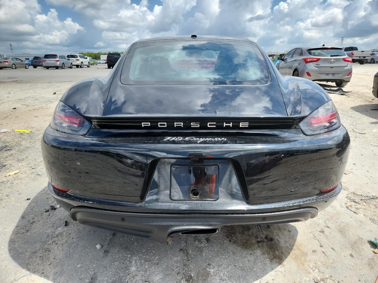 2024 Porsche Cayman Base   Black vin: WP0AA2A86RK255318