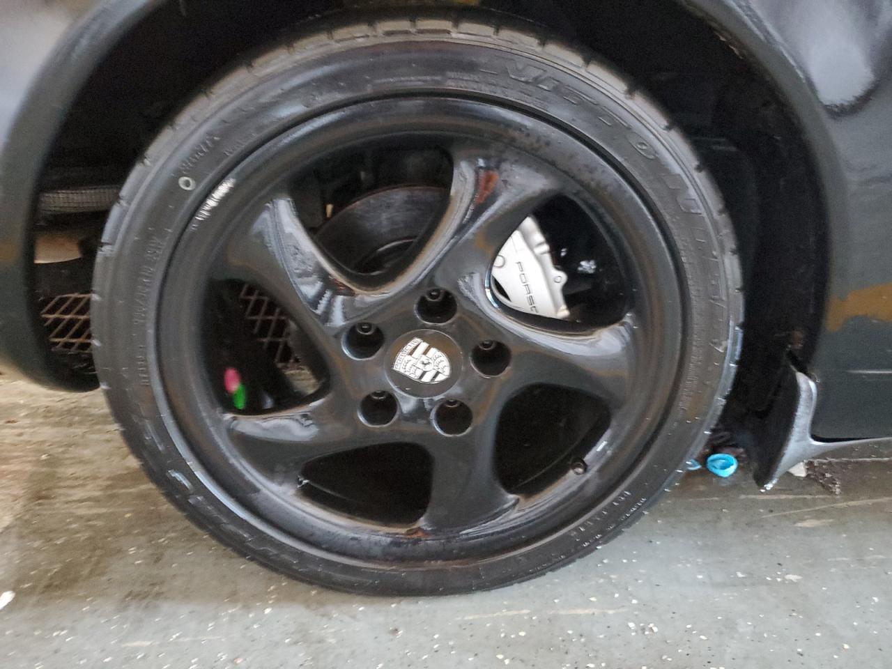 1999 Porsche Boxster Black vin: WP0CA2985XU629545 Damage: Right Rear Wheel, Curb Rash, 3 To 4 Inches