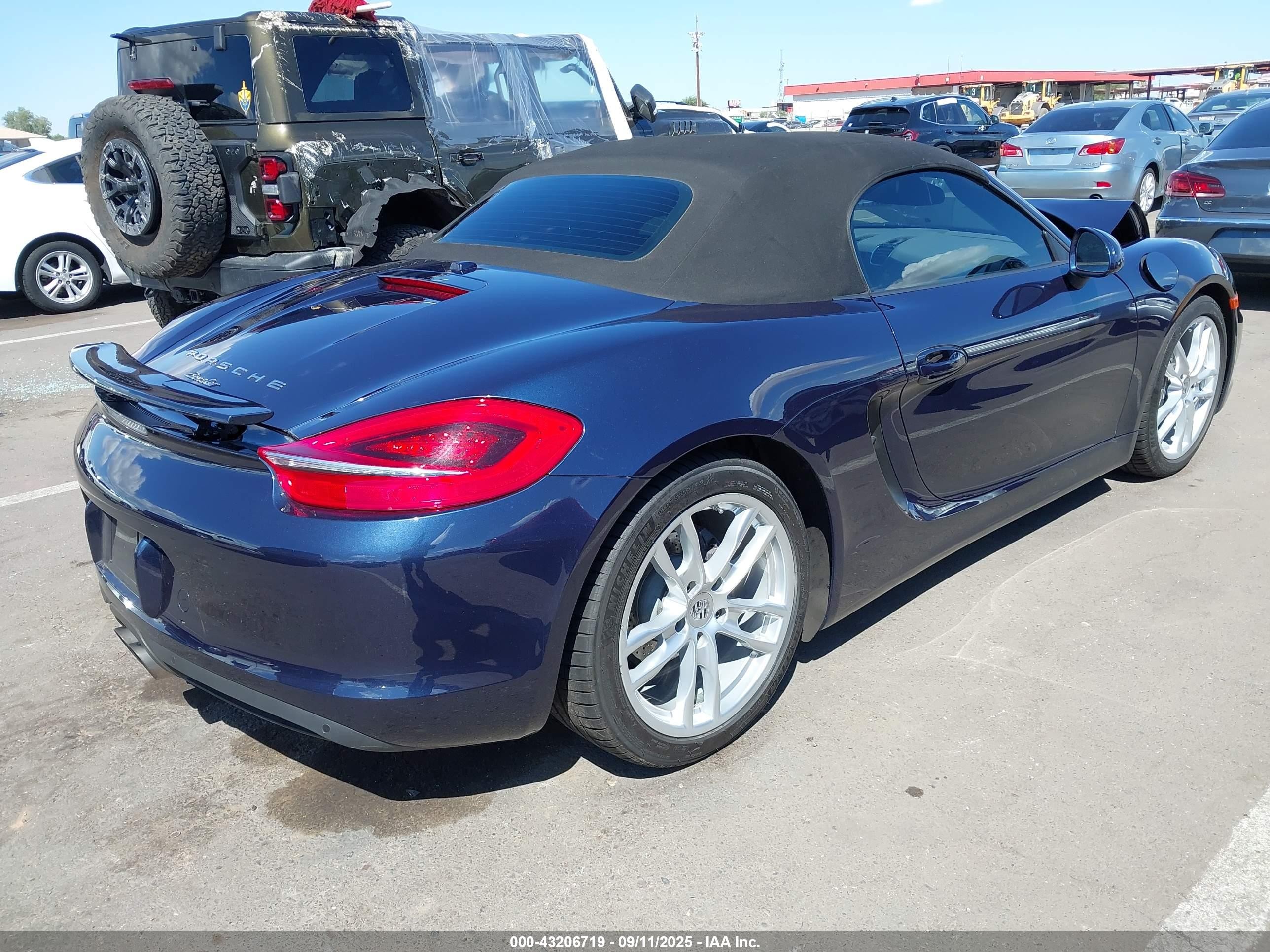 2014 Porsche Boxster   Blue vin: WP0CA2A81ES121027