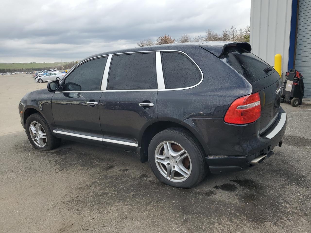 2009 Porsche Cayenne S Black vin: WP1AB29P09LA45962 Damage: Rear Bumper Cover Upper, Gouged, 1 To 2 Inches