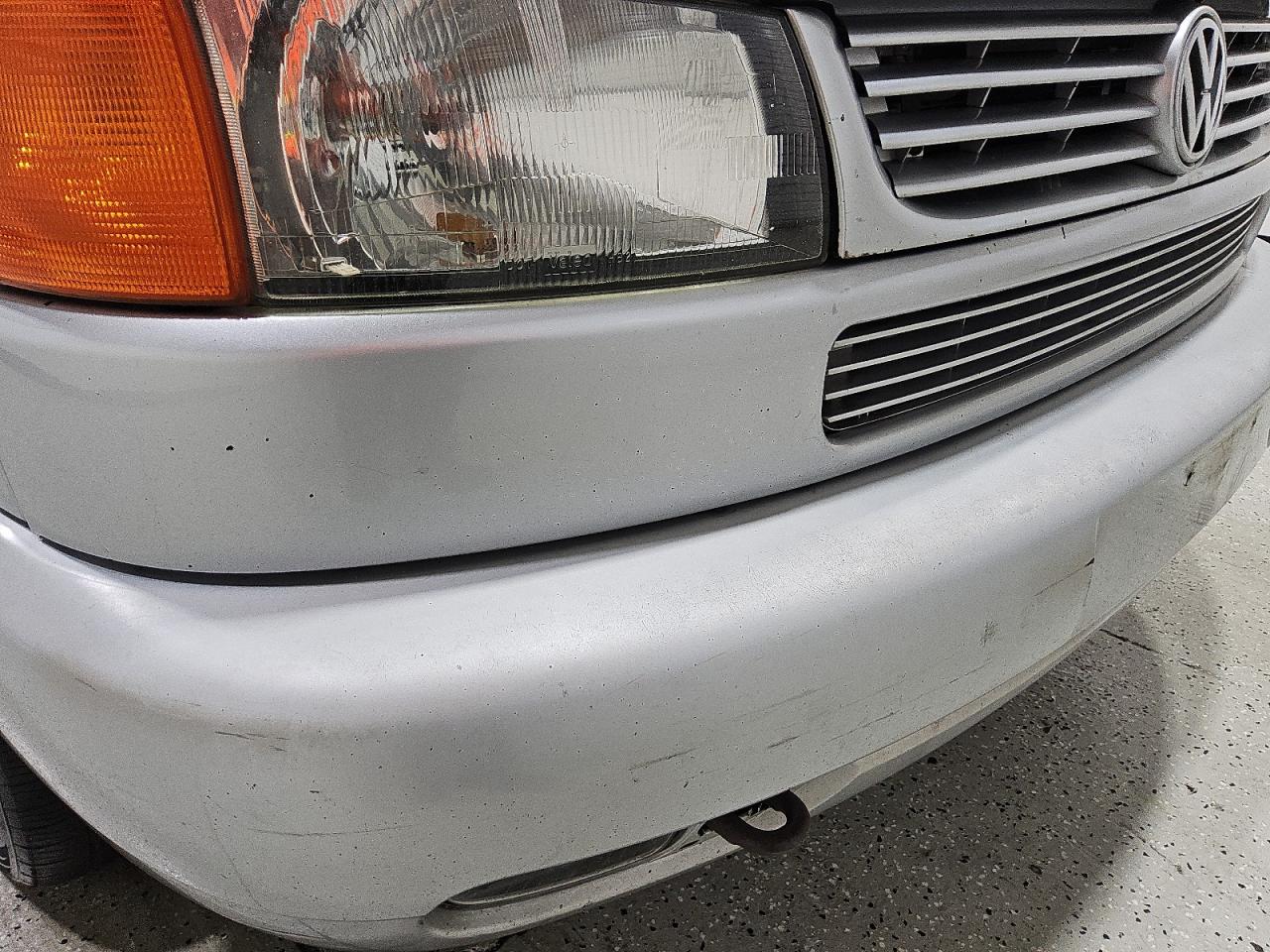 2002 Volkswagen Eurovan Mv Silver vin: WV2NB47012H017117 Damage: Front Bumper, Heavy Scratch, > 12 Inches