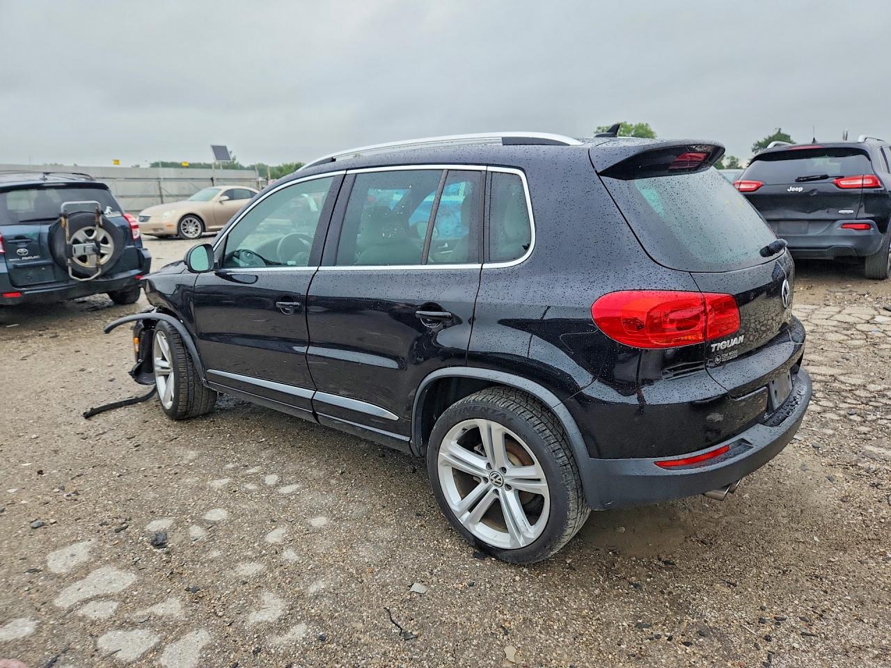 2014 Volkswagen Tiguan S Black vin: WVGAV3AX1EW064549