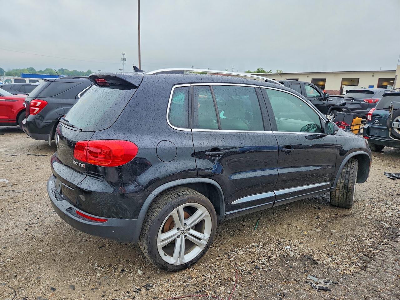 2014 Volkswagen Tiguan S Black vin: WVGAV3AX1EW064549
