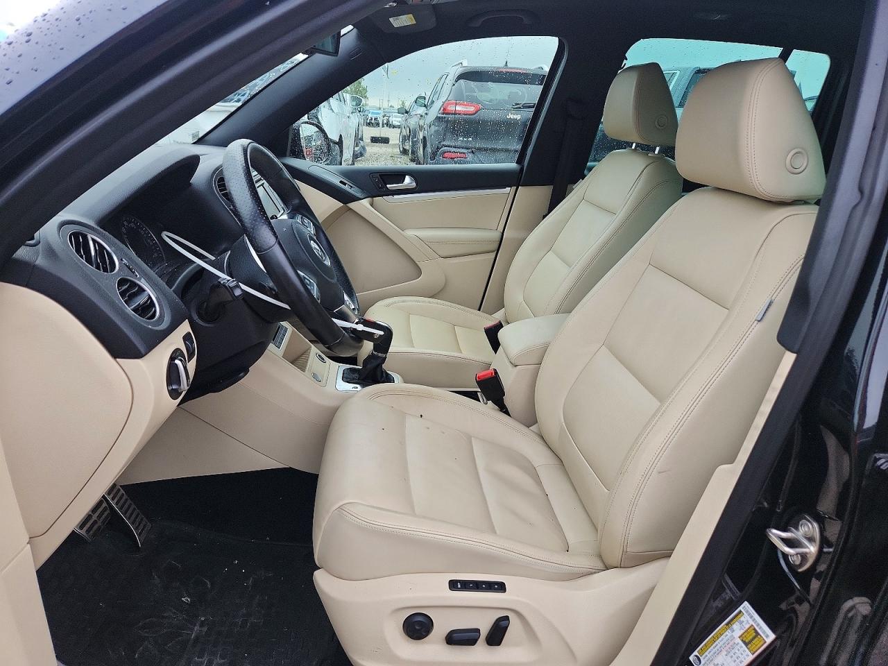 2014 Volkswagen Tiguan S Black vin: WVGAV3AX1EW064549