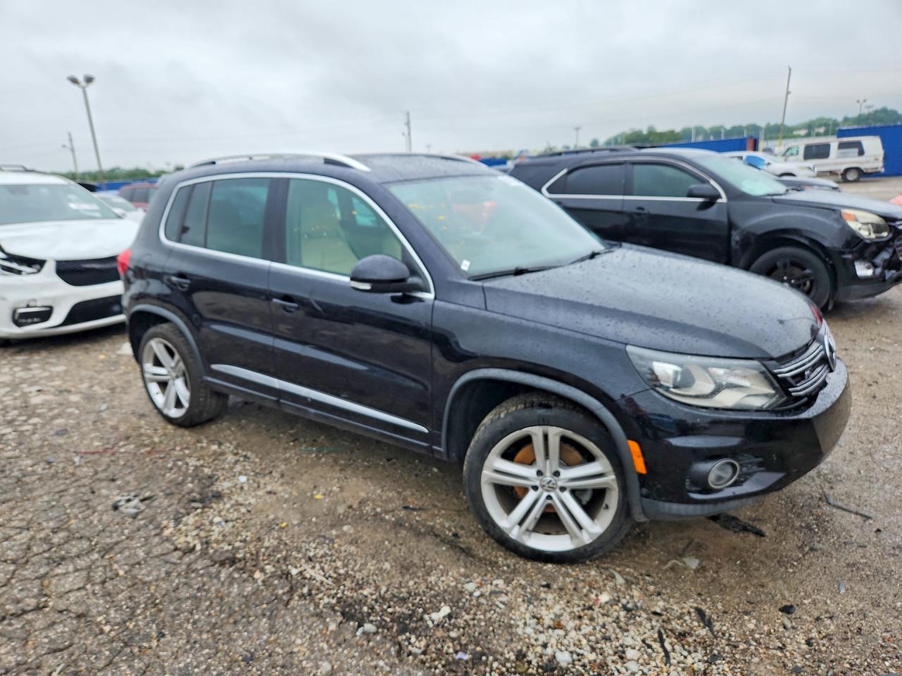 2014 Volkswagen Tiguan S Black vin: WVGAV3AX1EW064549