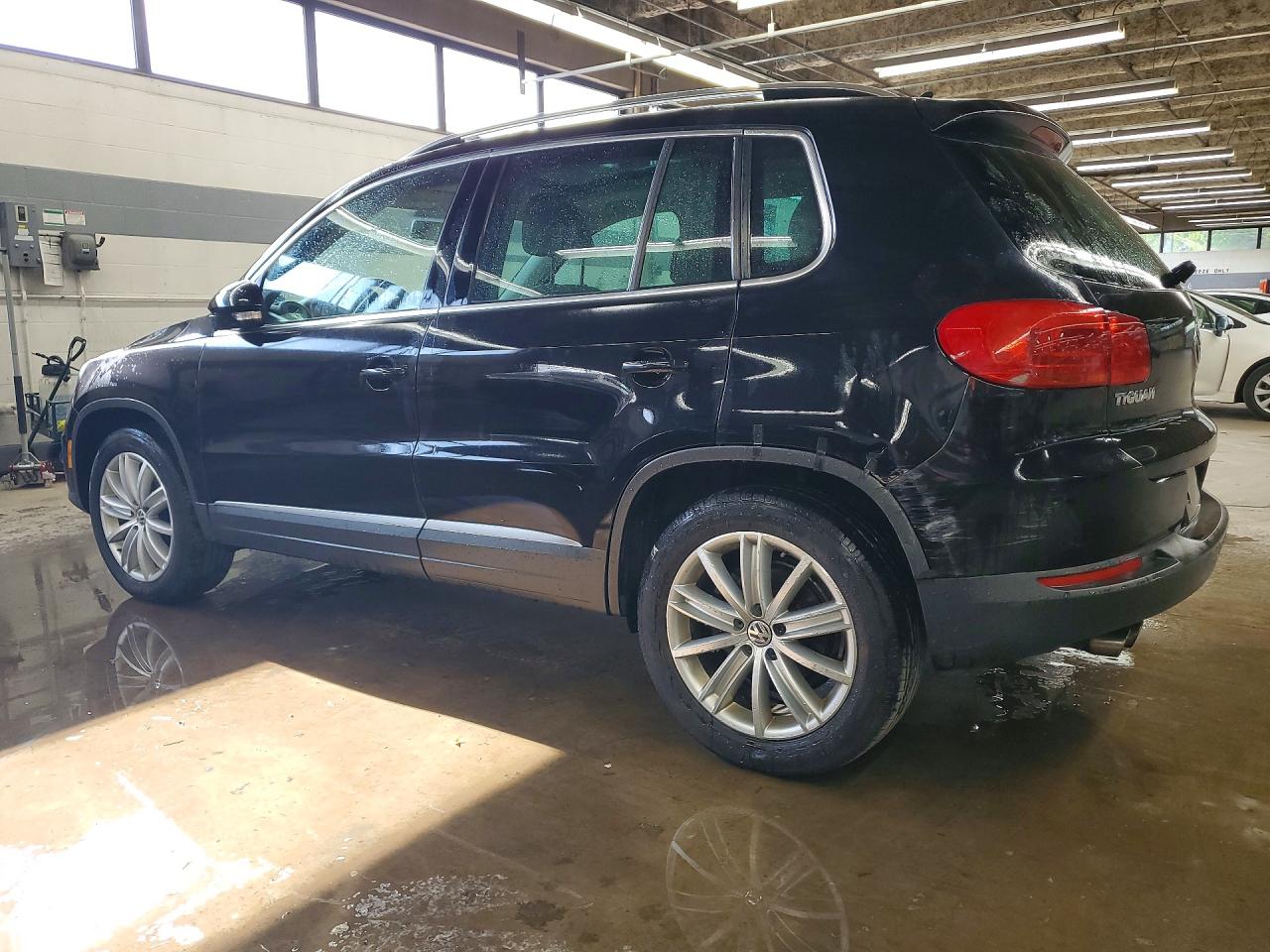 2013 Volkswagen Tiguan S Черный vin: WVGAV3AX2DW617711