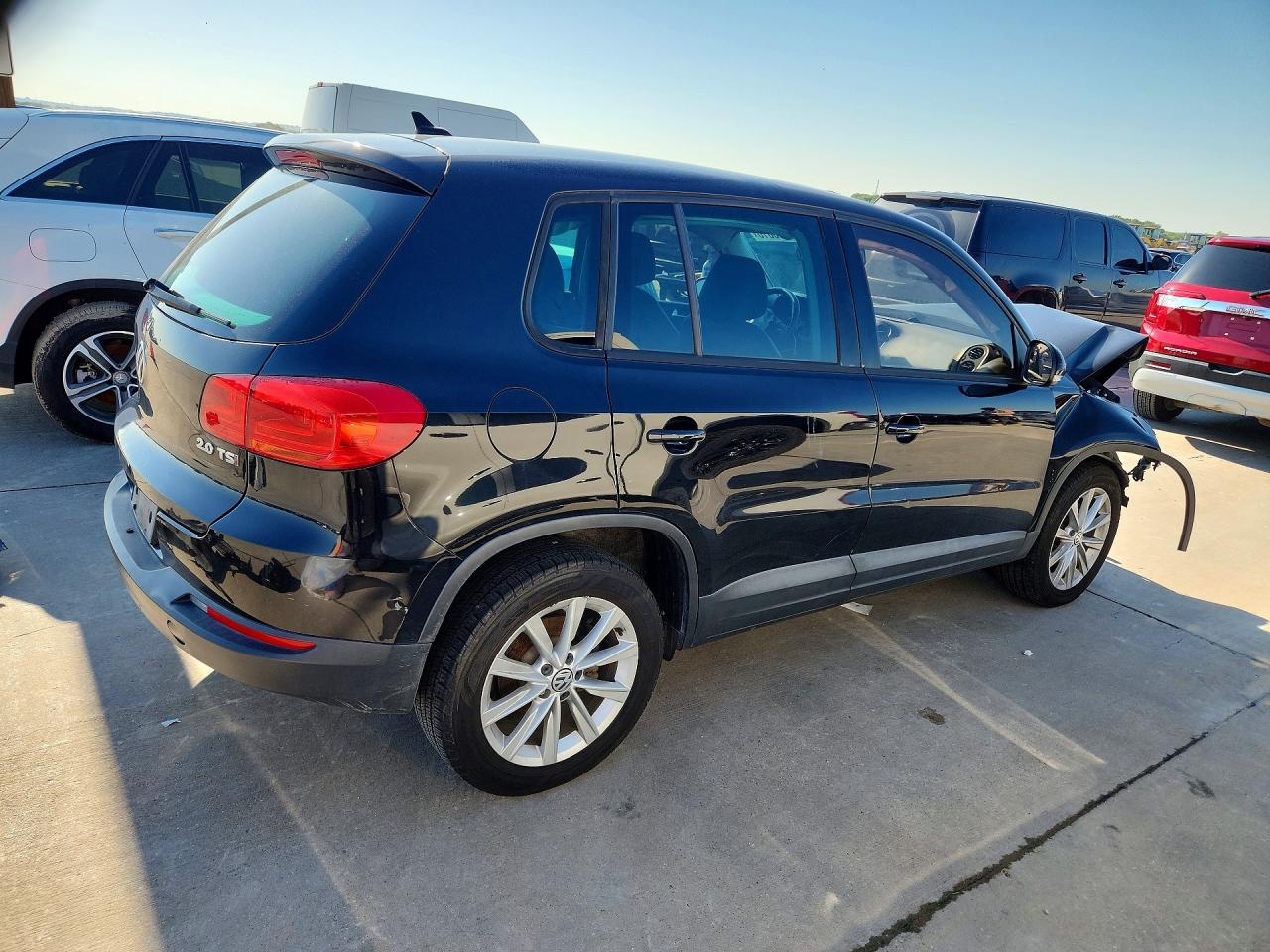 2014 Volkswagen Tiguan S Черный vin: WVGAV3AX3EW608291
