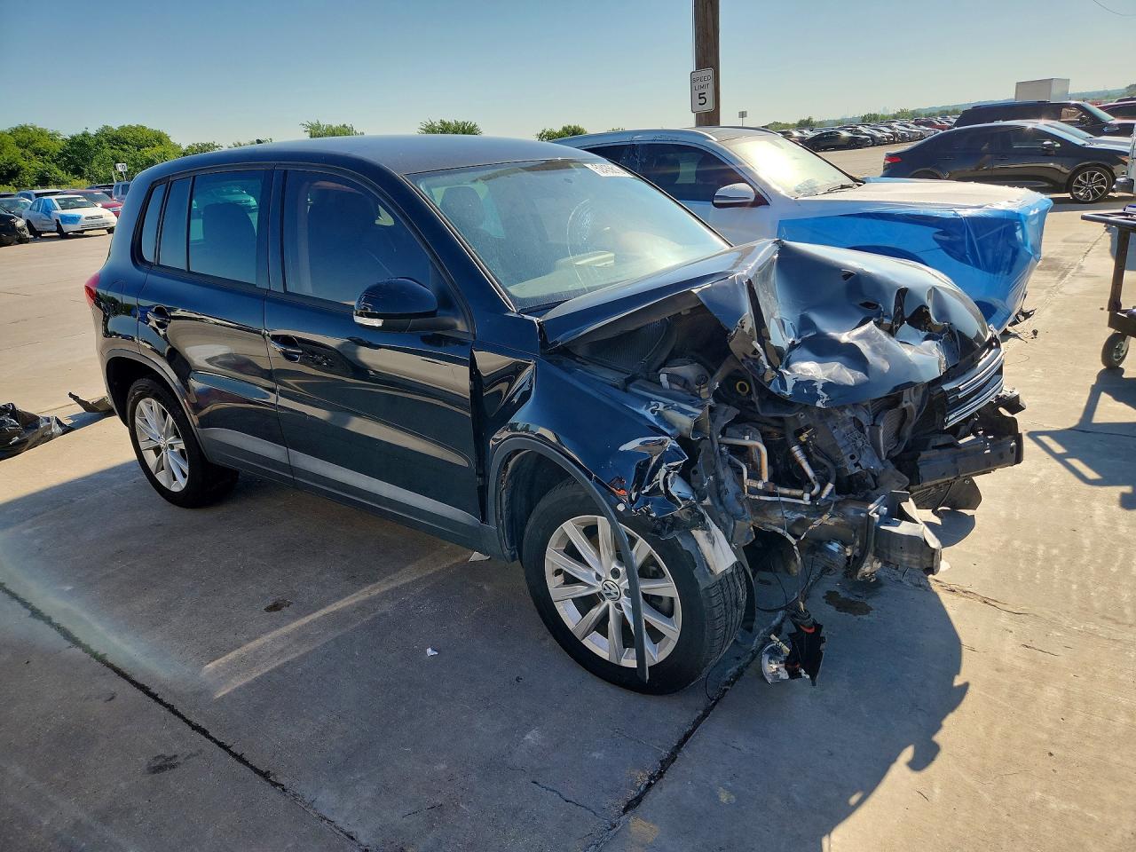 2014 Volkswagen Tiguan S Черный vin: WVGAV3AX3EW608291