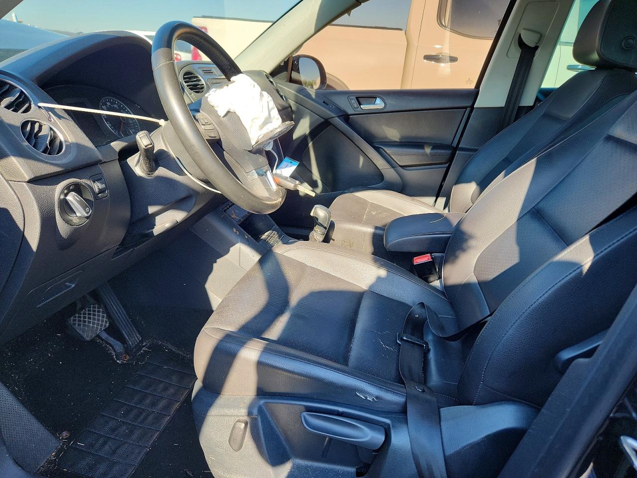 2014 Volkswagen Tiguan S Черный vin: WVGAV3AX3EW608291