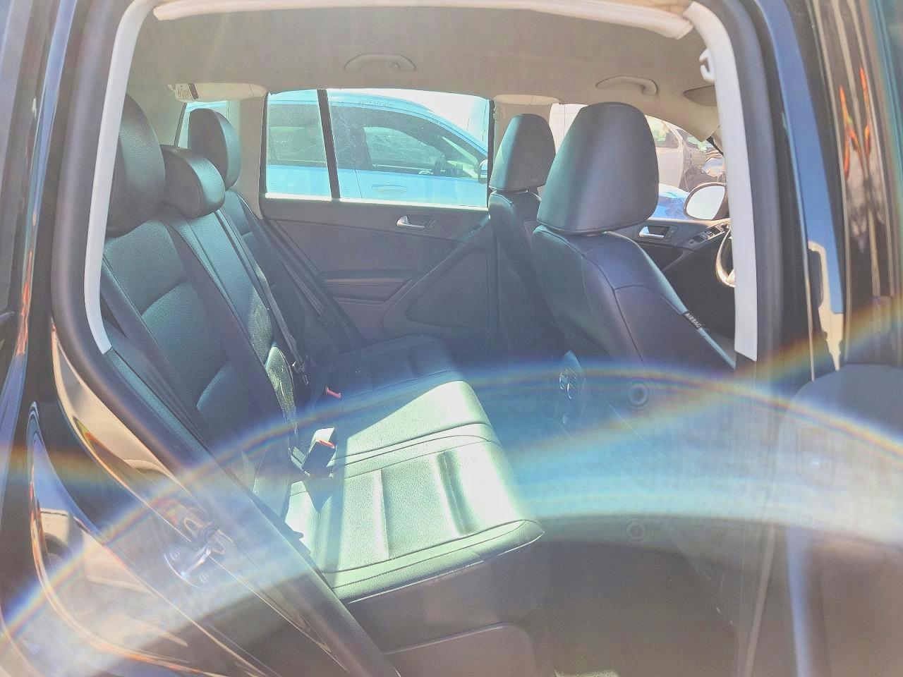 2014 Volkswagen Tiguan S Черный vin: WVGAV3AX3EW608291