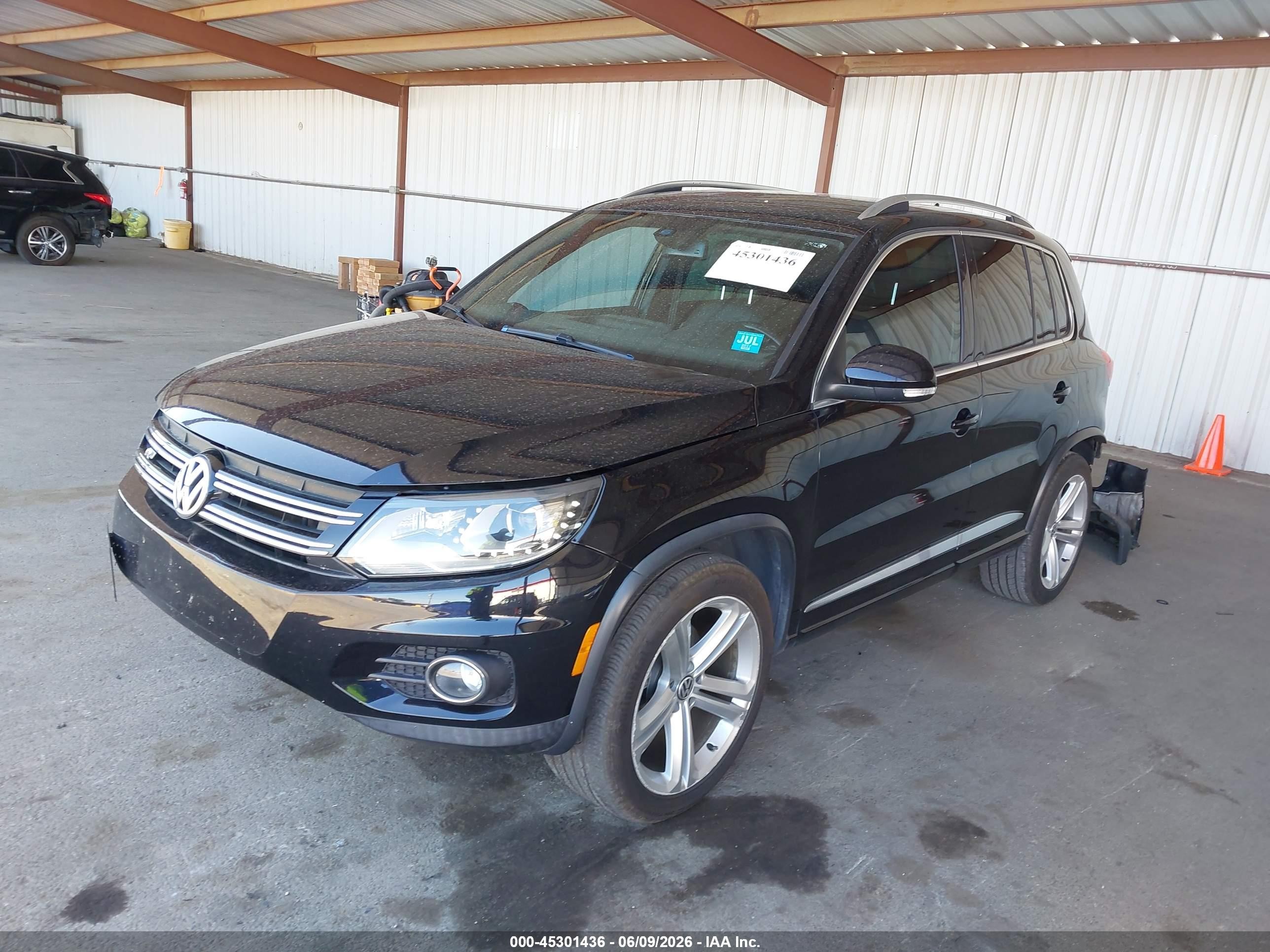 2014 Volkswagen Tiguan R-line Black vin: WVGAV3AX4EW109788