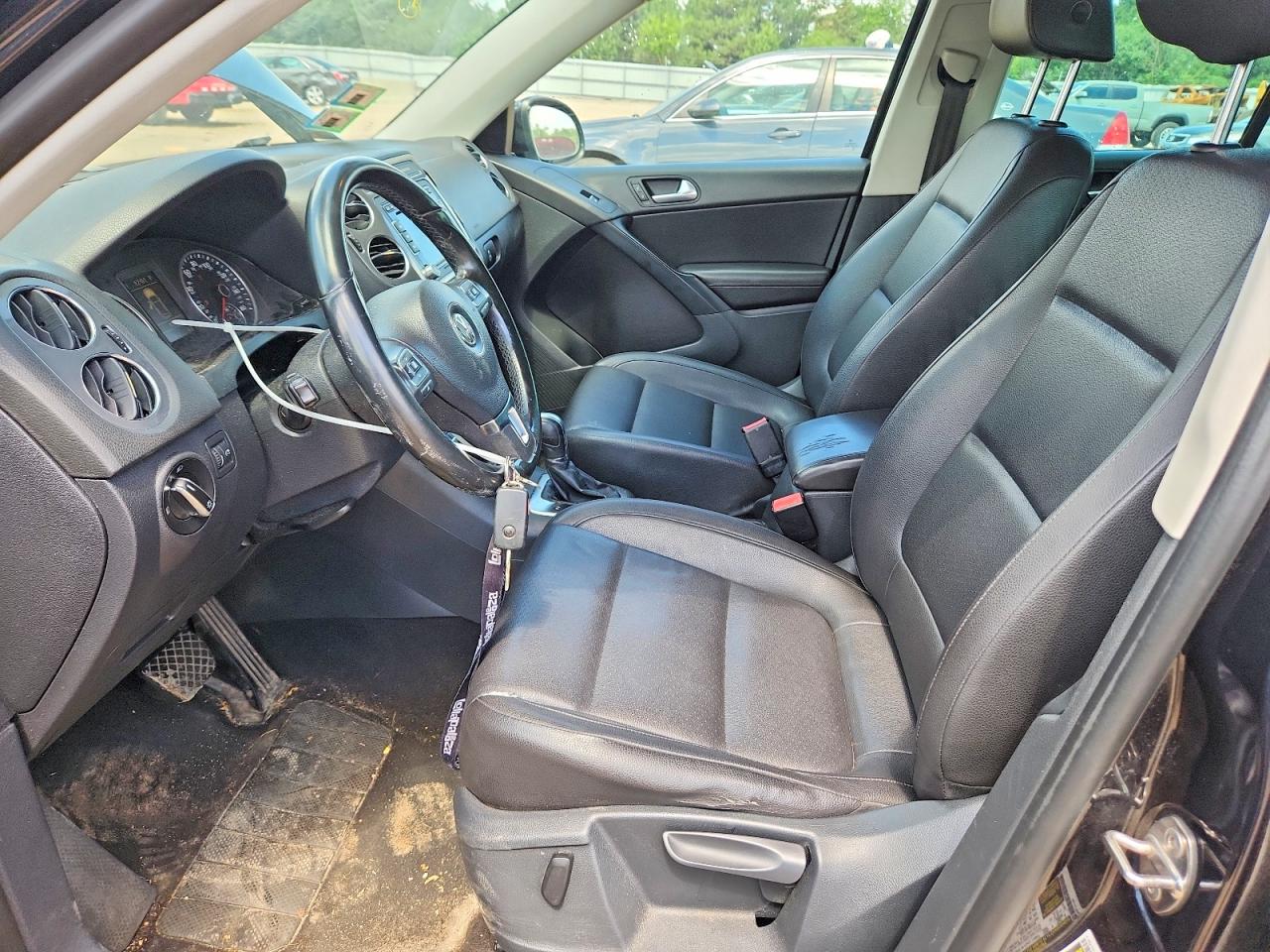 2014 Volkswagen Tiguan S Черный vin: WVGAV3AX4EW532046