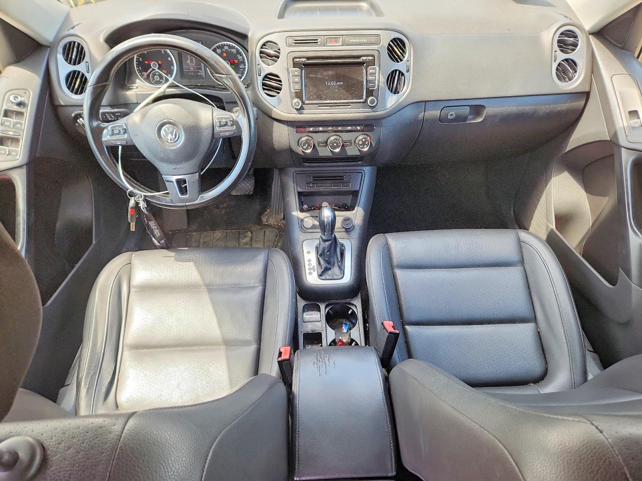 2014 Volkswagen Tiguan S Черный vin: WVGAV3AX4EW532046