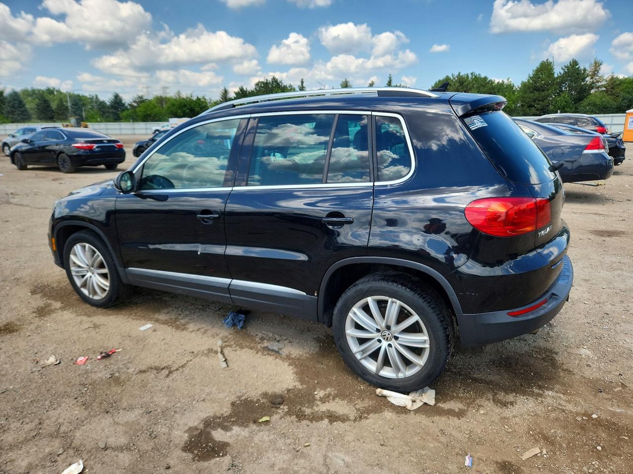 2014 Volkswagen Tiguan S Черный vin: WVGAV3AX4EW532046