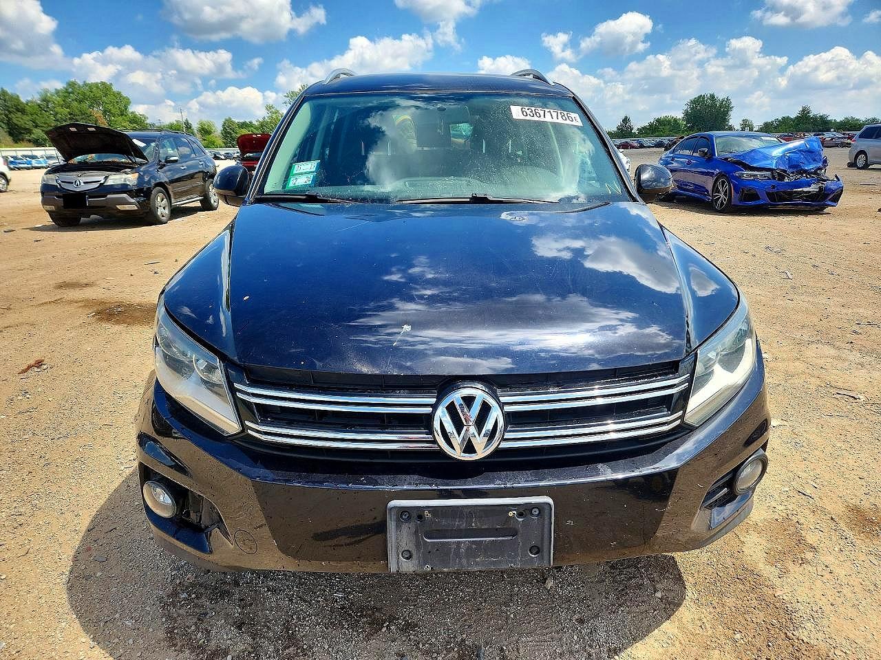 2014 Volkswagen Tiguan S Черный vin: WVGAV3AX4EW532046