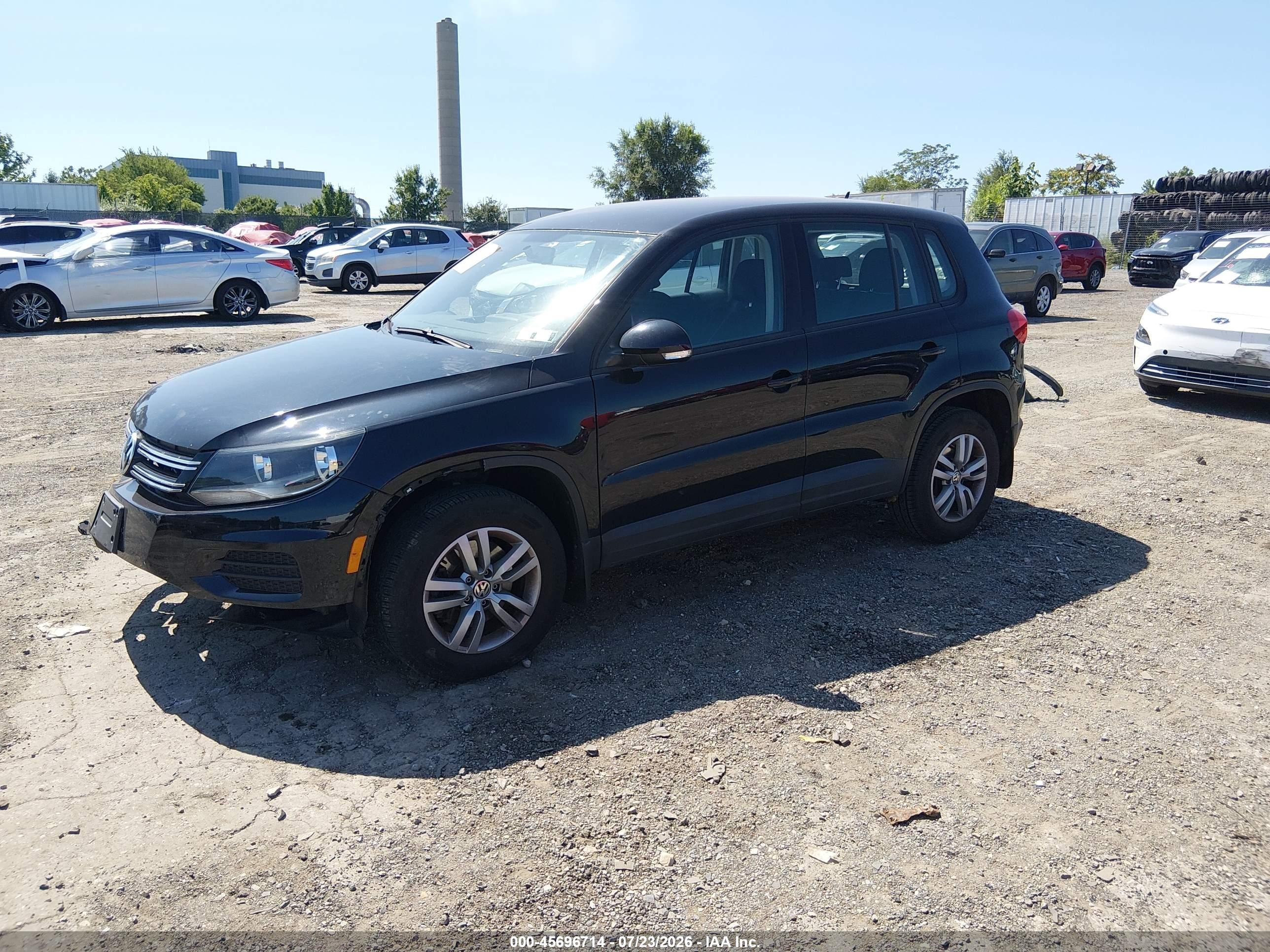 2014 Volkswagen Tiguan S Black vin: WVGAV3AX4EW593218