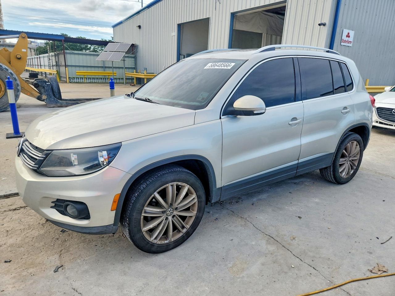 2013 Volkswagen Tiguan S Beige vin: WVGAV3AX5DW617170