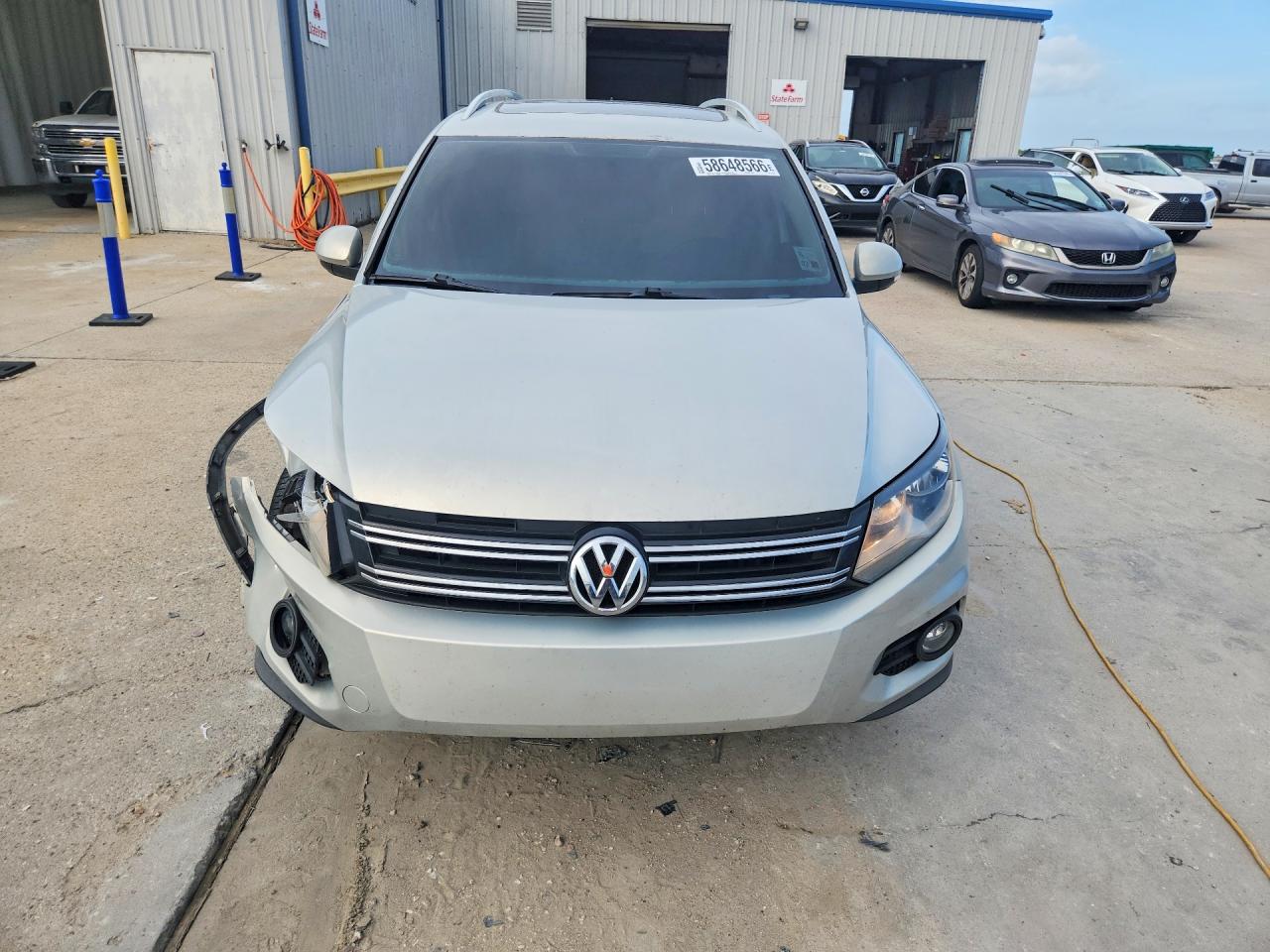 2013 Volkswagen Tiguan S Beige vin: WVGAV3AX5DW617170
