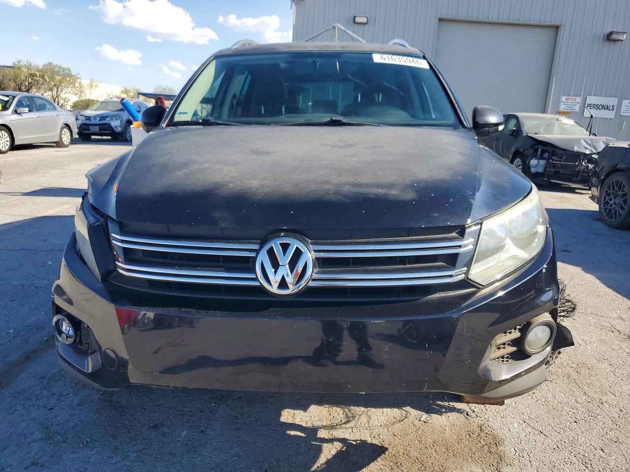 2013 Volkswagen Tiguan S Black vin: WVGAV3AX6DW598659