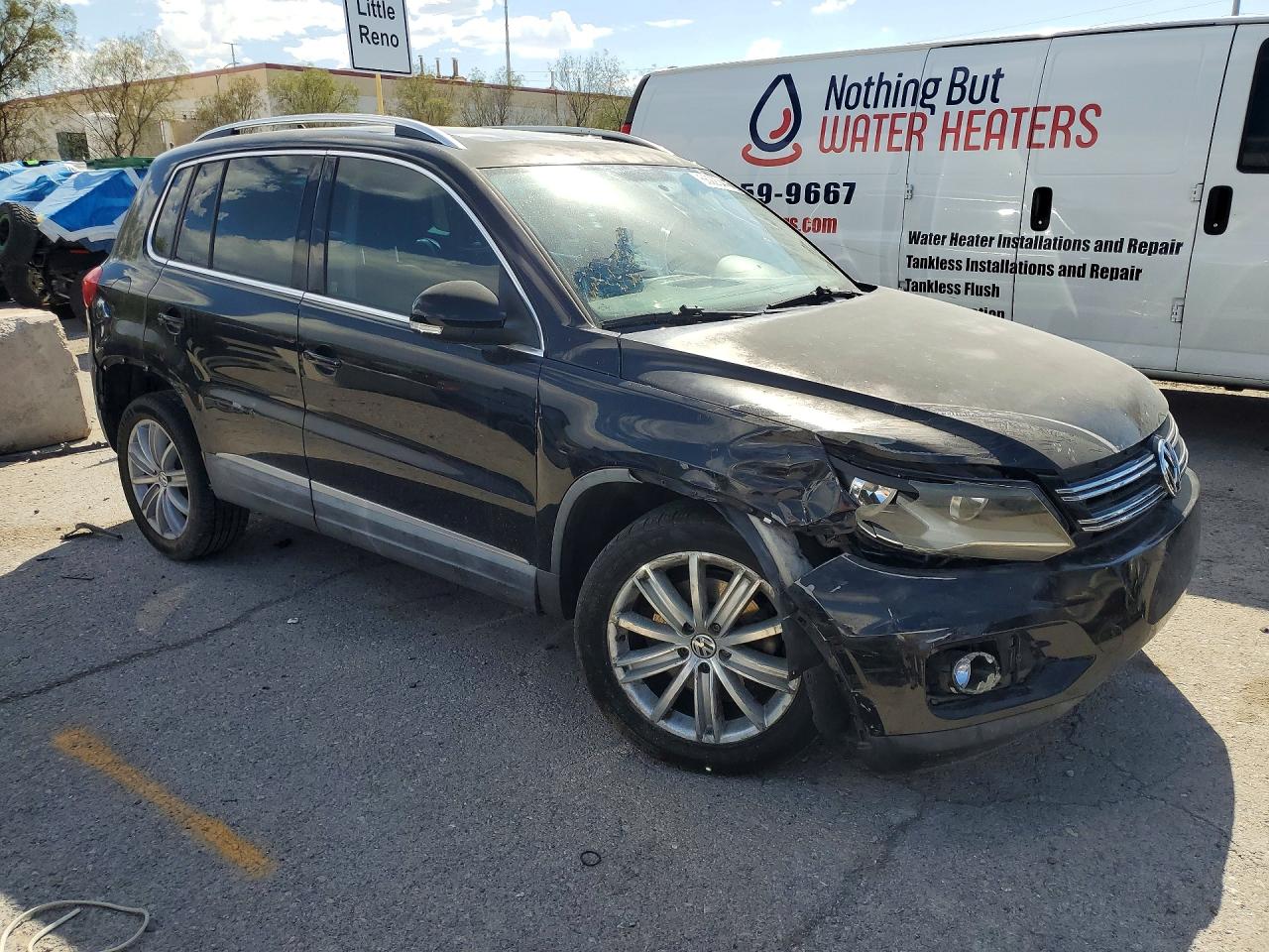 2013 Volkswagen Tiguan S Черный vin: WVGAV3AX6DW598659