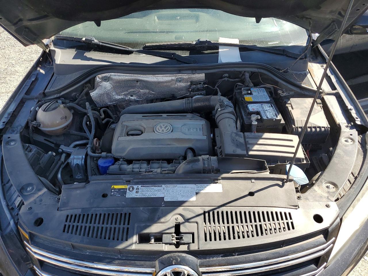 2013 Volkswagen Tiguan S Черный vin: WVGAV3AX6DW598659