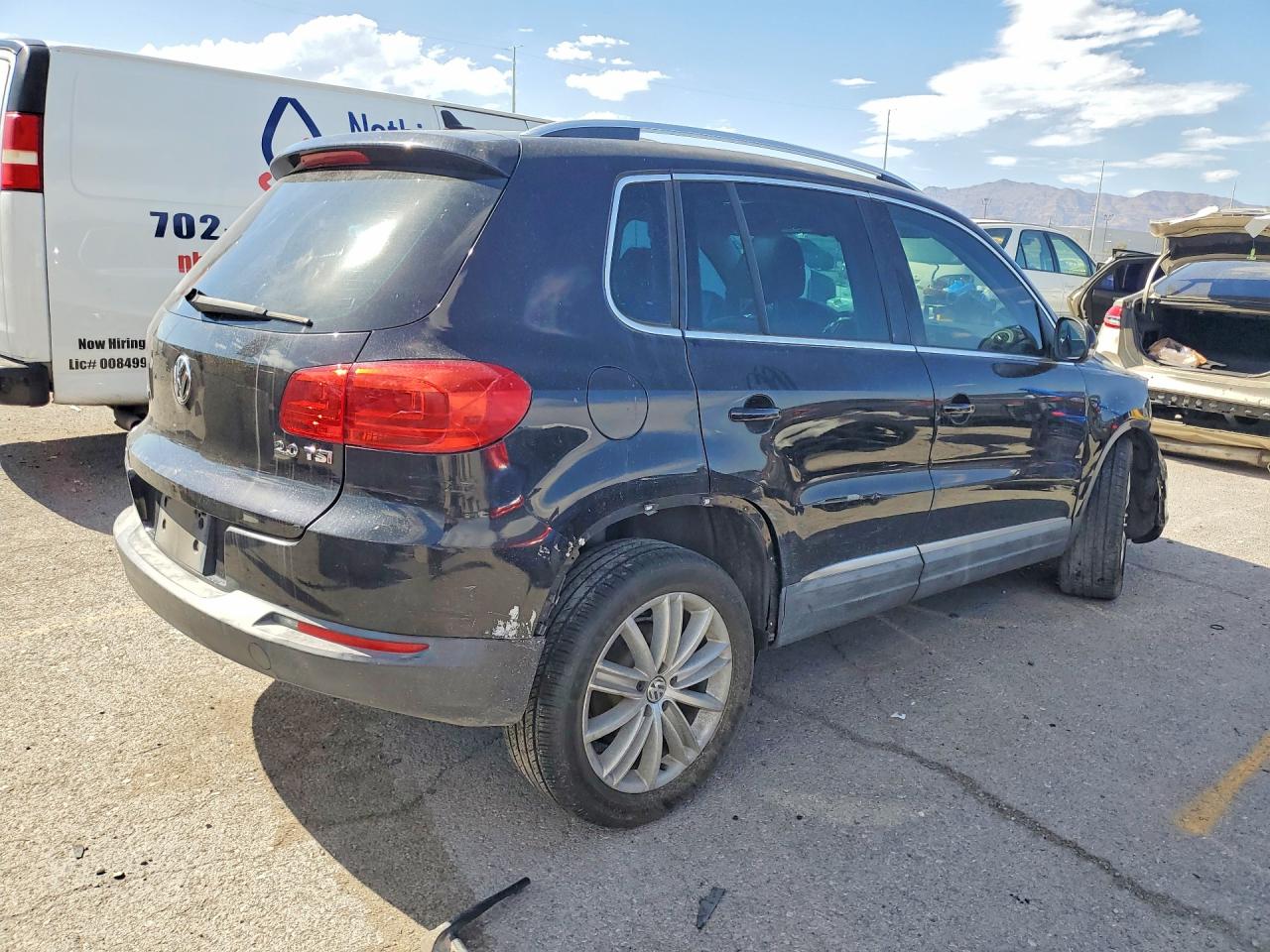 2013 Volkswagen Tiguan S Черный vin: WVGAV3AX6DW598659