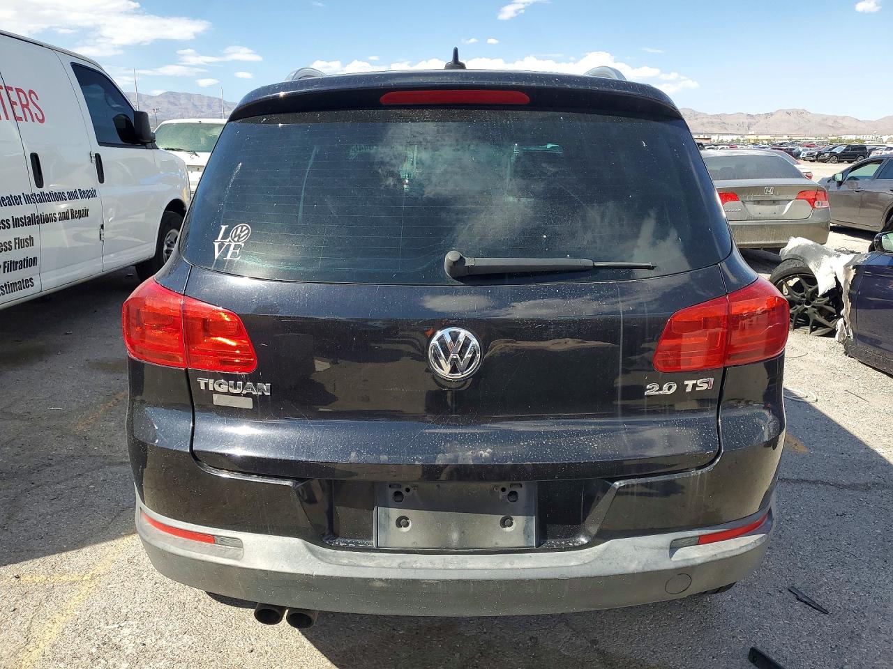 2013 Volkswagen Tiguan S Черный vin: WVGAV3AX6DW598659