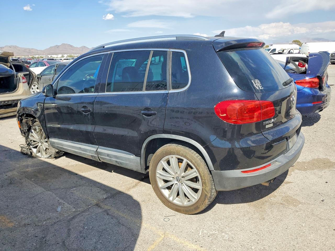 2013 Volkswagen Tiguan S Черный vin: WVGAV3AX6DW598659