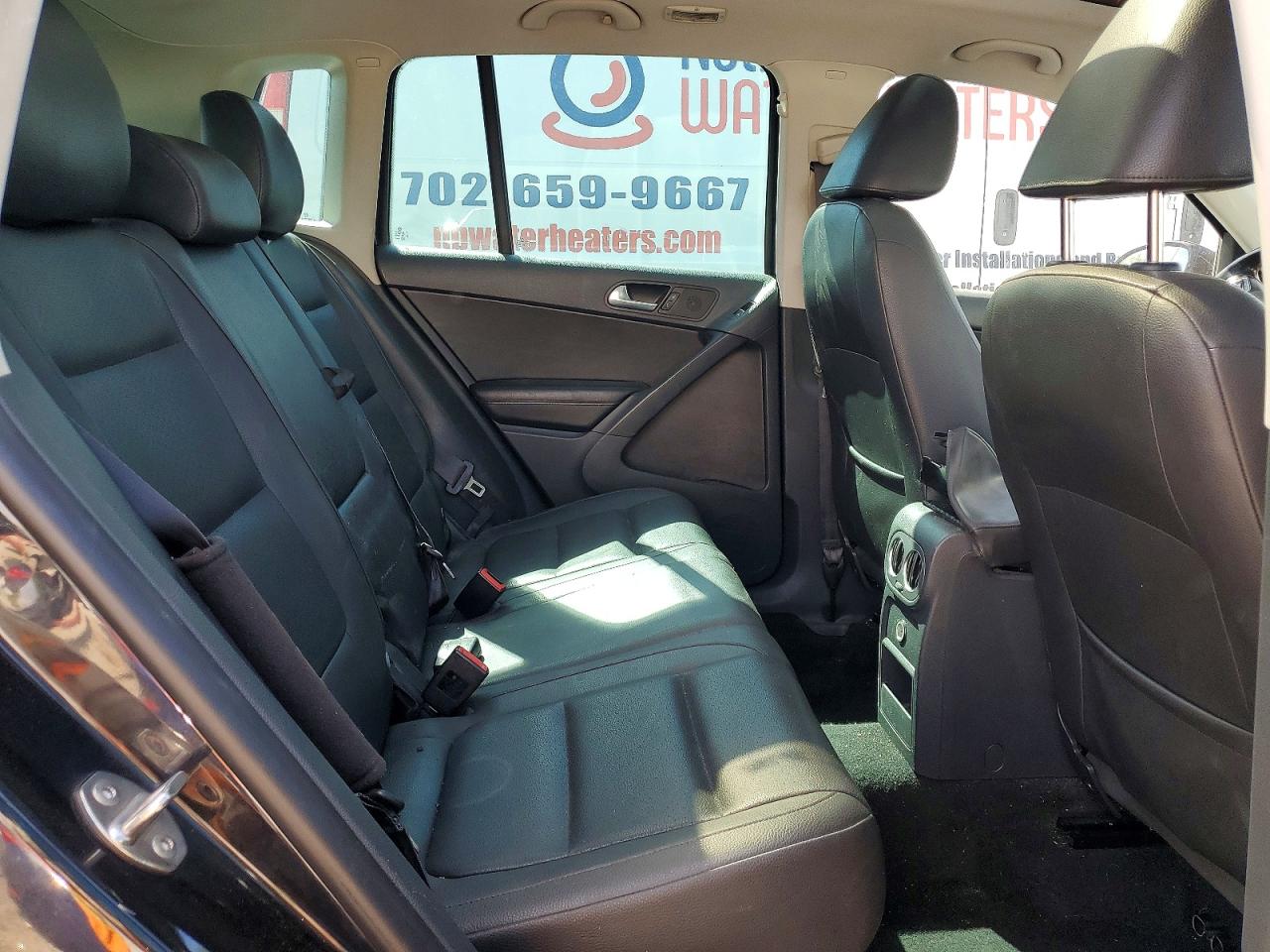 2013 Volkswagen Tiguan S Черный vin: WVGAV3AX6DW598659