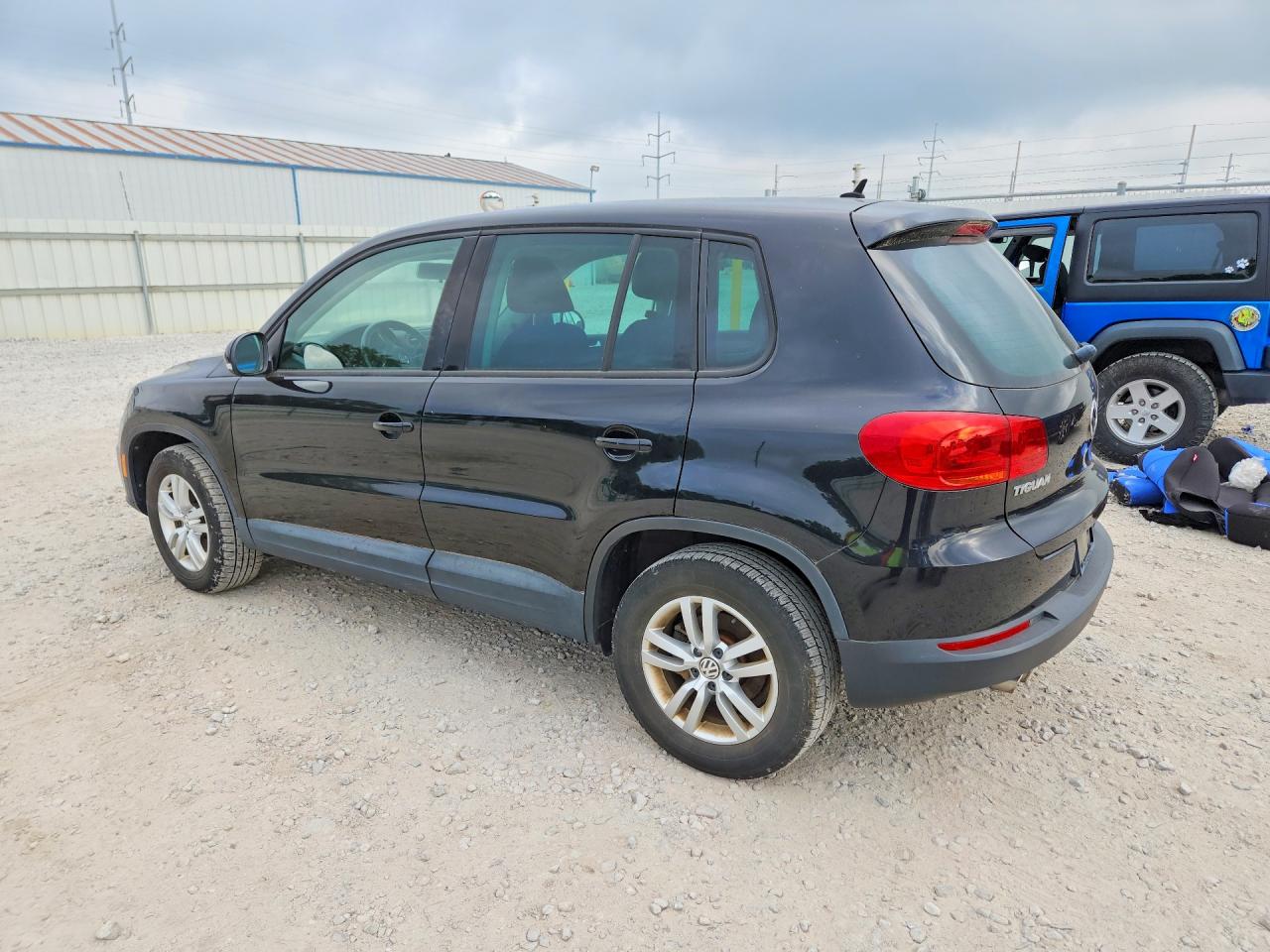 2013 Volkswagen Tiguan S Black vin: WVGAV3AX7DW592000