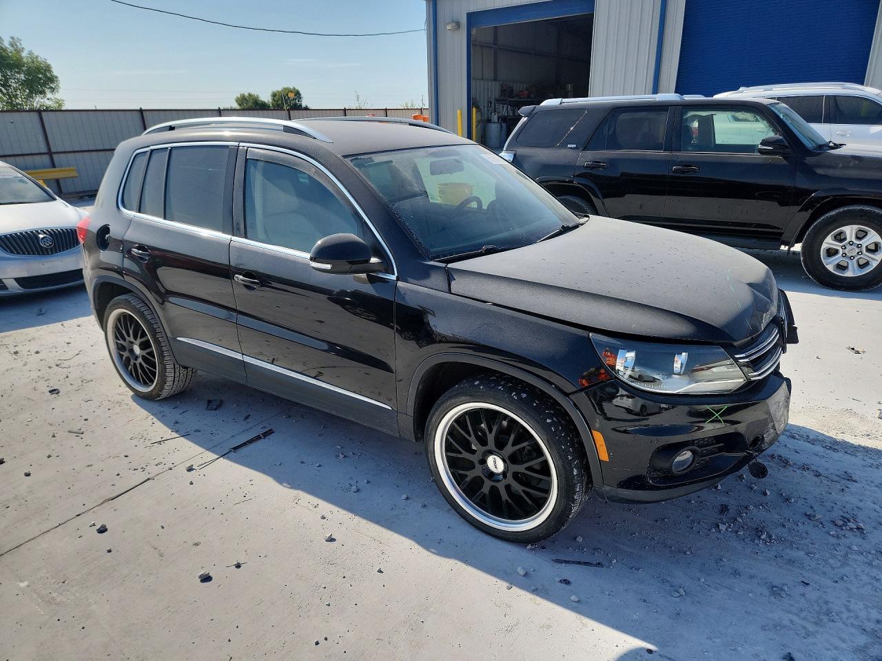 2014 Volkswagen Tiguan S Black vin: WVGAV3AX7EW528024